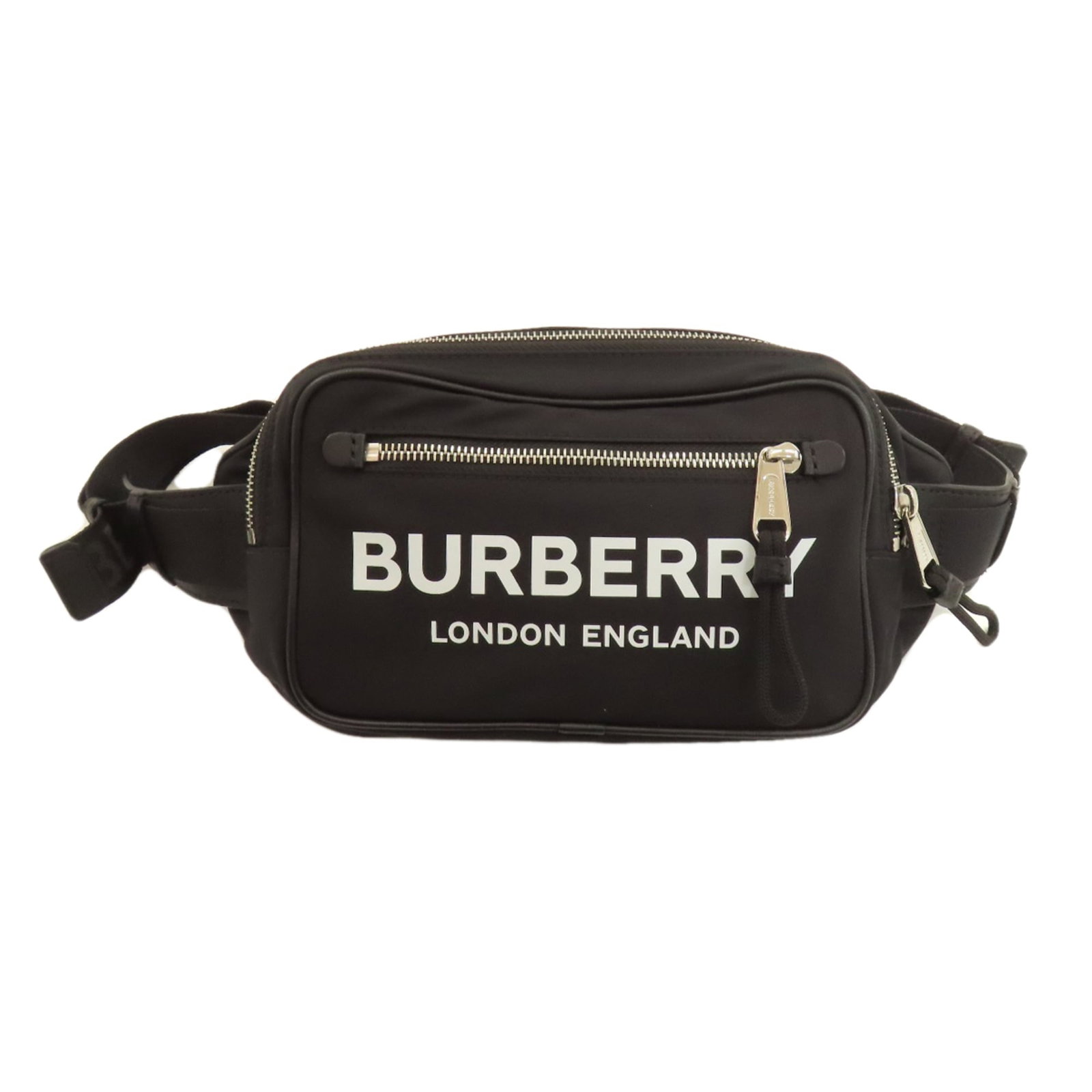 Burberry pack nylon: Burberry pack nylon Burberry's iconic pack nylon is a stylish and functional accessory, featuring a sleek black nylon material and a compact 15cm x 30cm x 6cm design. This versatile fanny pack is a