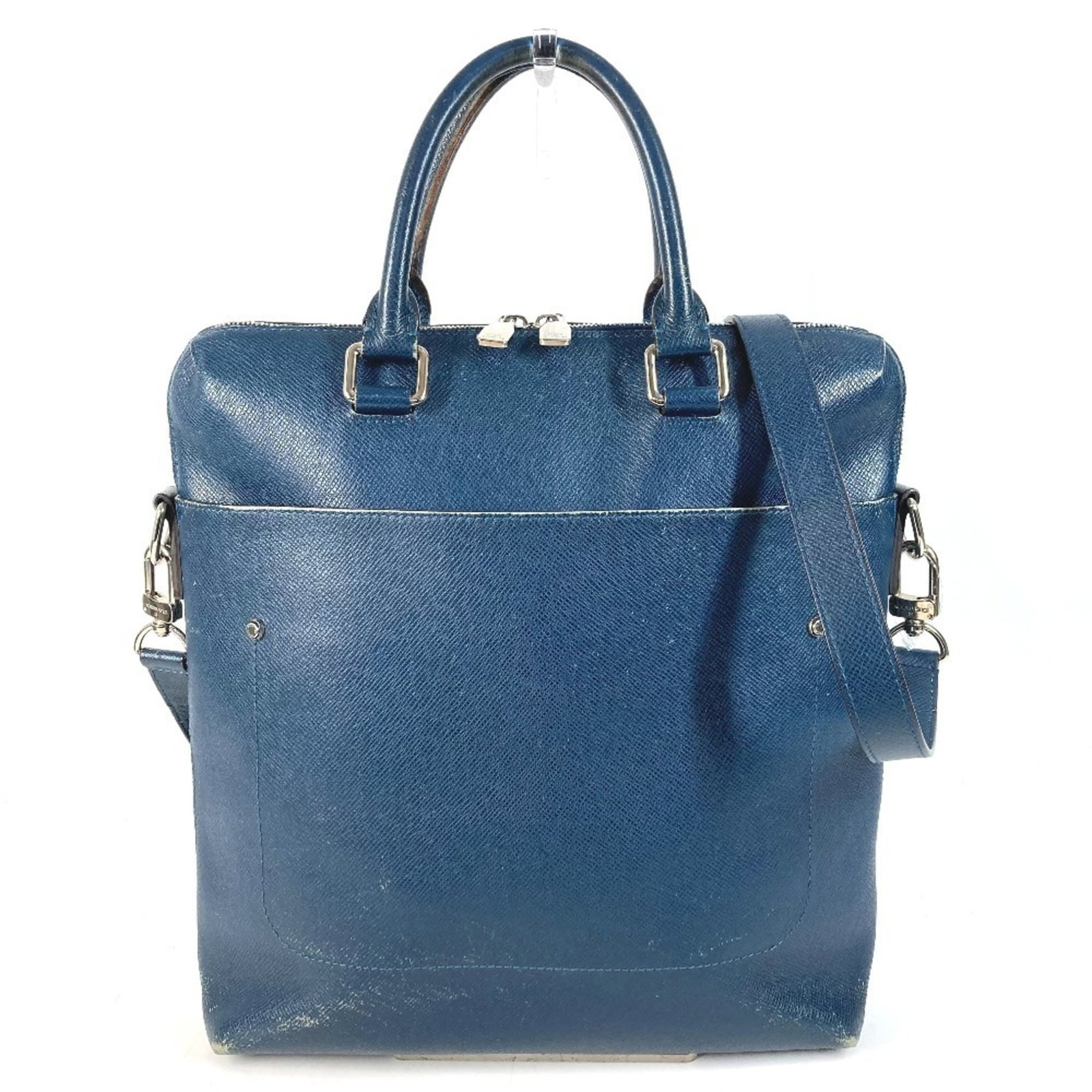 Taiga Leather Louis Vuitton Tote Bag: Taiga Leather Louis Vuitton Tote Bag Taiga Leather Louis Vuitton Tote Bag is crafted from high-quality Taiga leather, a distinctive material known for its unique texture and durability. This iconic