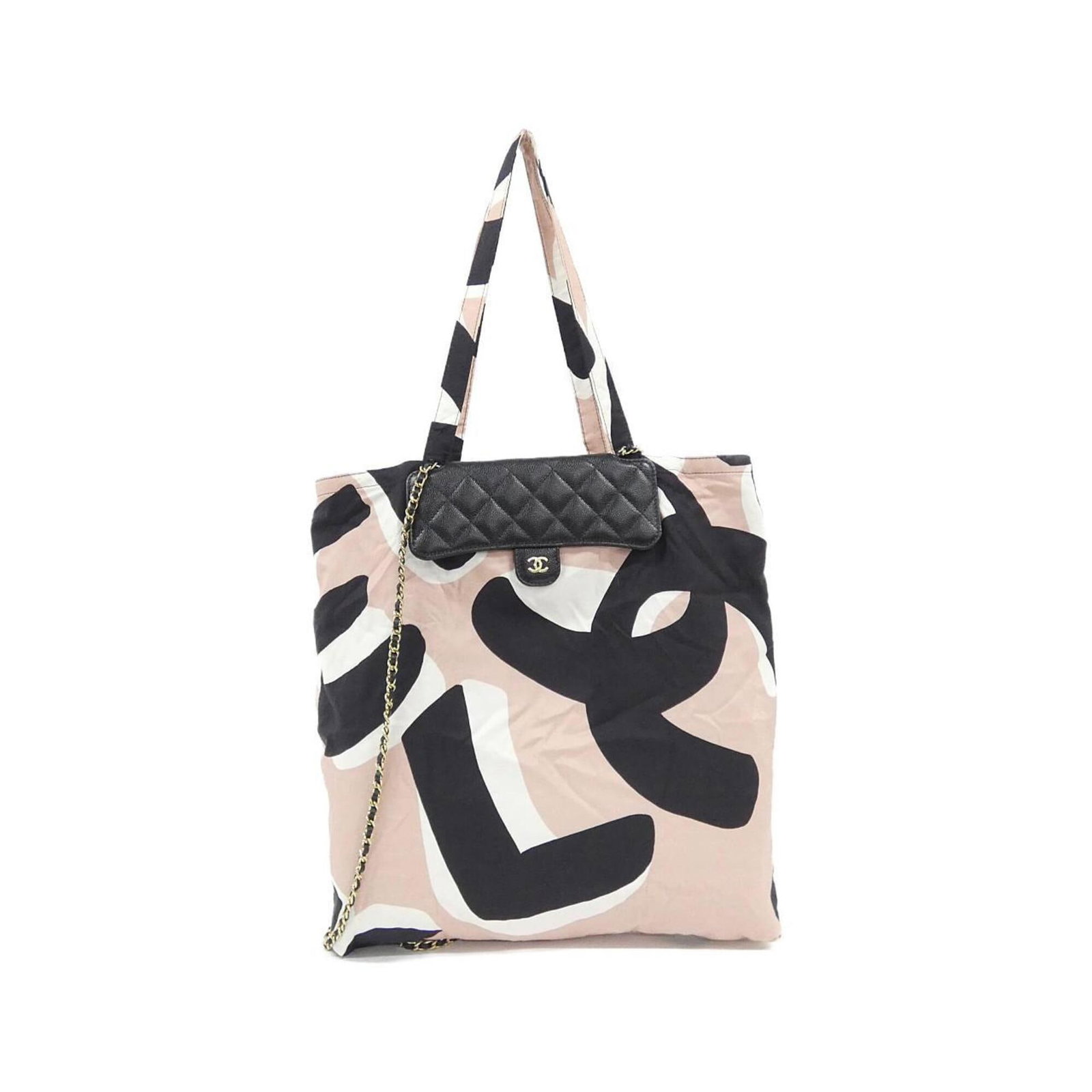 Handbag Canvas by Chanel: Handbag Canvas by Chanel Canvas by Chanel is a sleek and sophisticated handbag made from high-quality canvas material, available in two stylish colors: black and pink. The classic design features gold