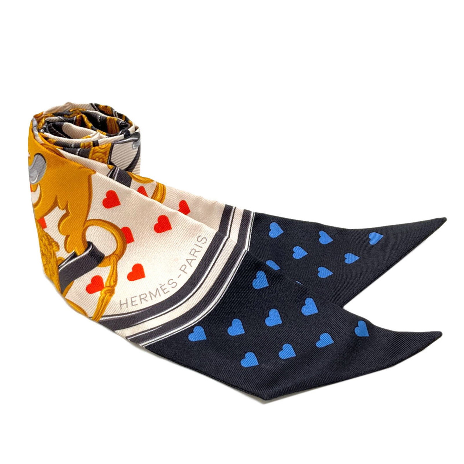 Silk Hermes Scarf: Silk Hermes Scarf Silk from the renowned French fashion house Hermes, this scarf boasts a sleek black design that exudes timeless elegance. Its compact size and vibrant red accents add a pop of color 