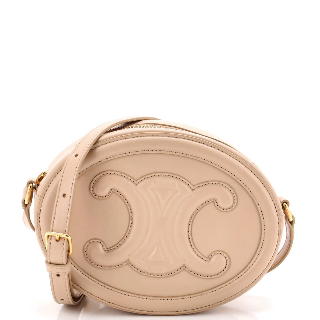 Celine Triomphe Oval Crossbody Bag Leather: Celine Triomphe Oval Crossbody Bag Leather The Celine Triomphe Oval Crossbody Bag Leather boasts a sleek, neutral exterior with a sophisticated gold hardware accent. Measuring 6" tall, 8" wide, and