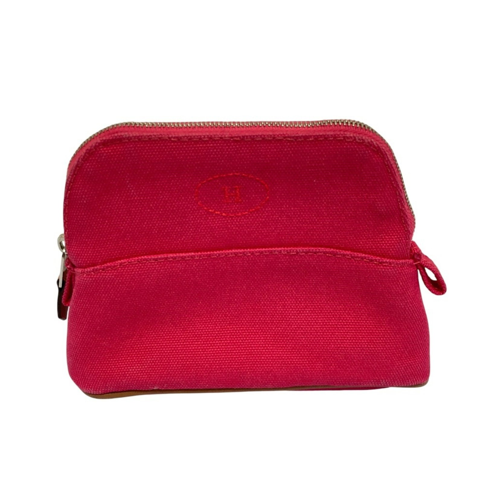 Pouch Canvas Hermes: Pouch Canvas Hermes Pink canvas pouch from Hermes, measuring 11cm x 15.5cm x 5cm. This small, stylish pouch features a vibrant pink color and is made from canvas material. Item Specifics: Brand:
