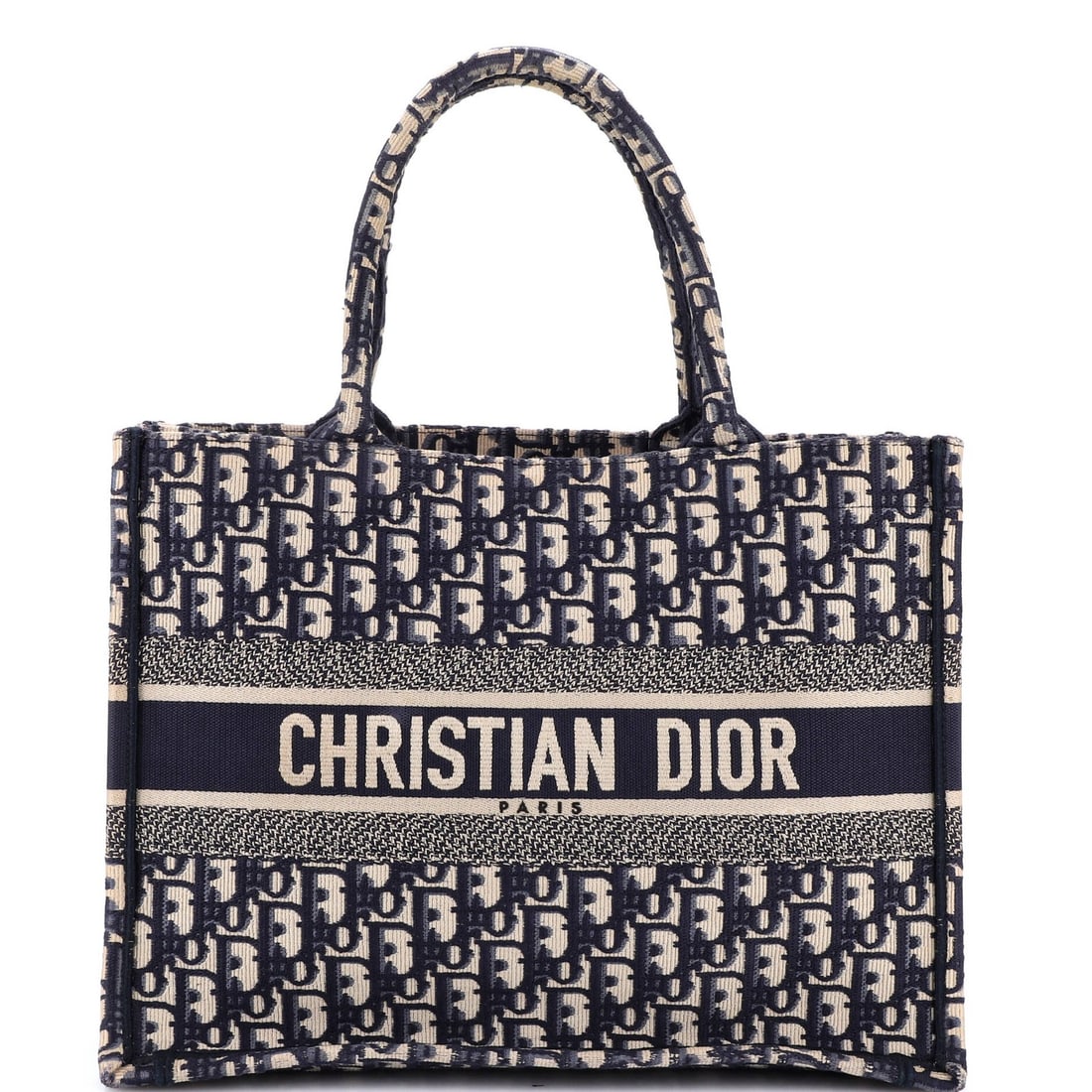 Dior Book Canvas Tote Oblique Medium Christian: Dior Book Canvas Tote Oblique Medium Christian This Christian Dior Book Tote Oblique in Medium size features a striking blue canvas exterior with a classic oblique design. The tote boasts a sturdy han