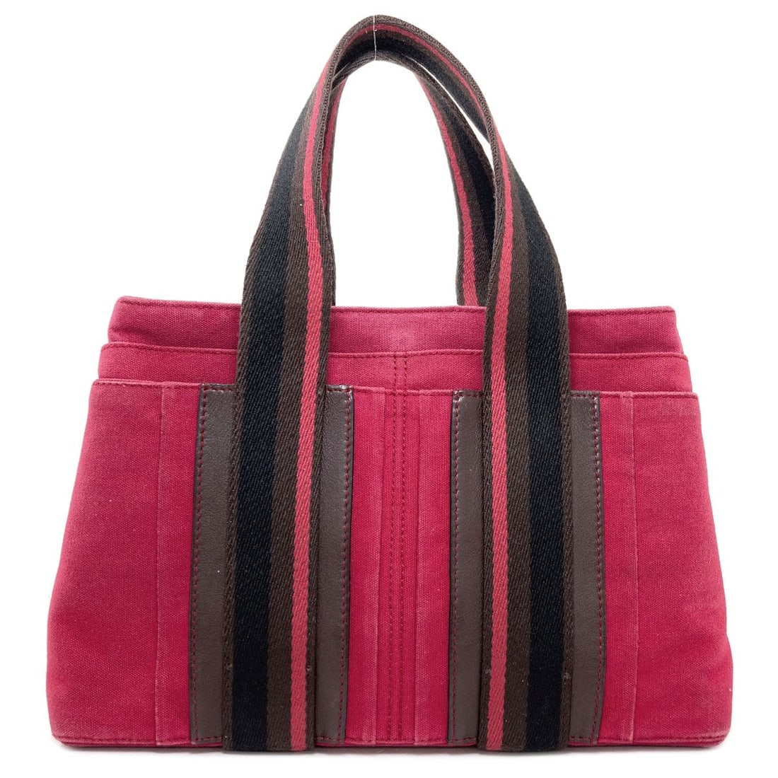 Hermes Toroca Horizontal Pm Handbag Canvas: Hermes Toroca Horizontal Pm Handbag Canvas Pink canvas handbag from HERMES, featuring a signature on the exterior. This style showcases the brand's iconic design with a bold, eye-catching pink color. 