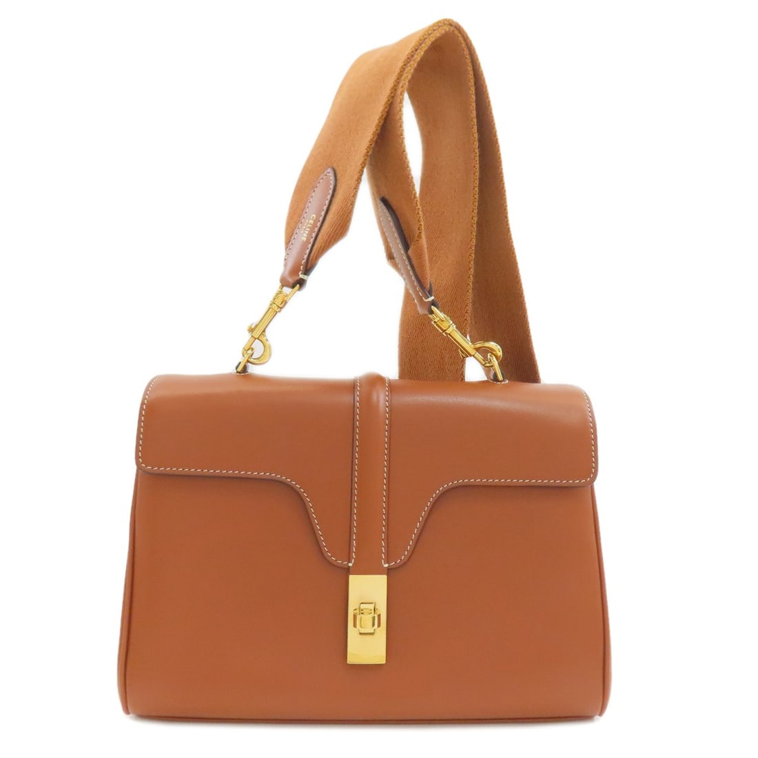 Calf Soft Teen Saze Celine Bag: Calf Soft Teen Saze Celine Bag Soft to the touch, this Celine bag features a classic brown calf leather exterior with a turn lock closure. Measuring 9.1 inches wide and 6.7 inches tall, its compact