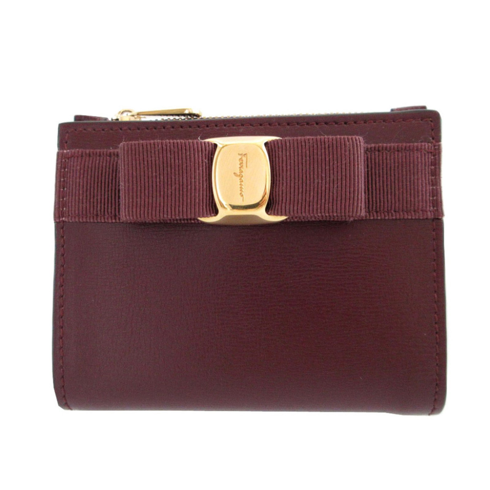 Salvatore Ferragamo Leather Wallet Bi-Fold: Salvatore Ferragamo Leather Wallet Bi-Fold Salvatore Ferragamo Leather Wallet Bi-Fold - A stylish and sophisticated accessory from Italy, this bi-fold wallet features premium leather construction and