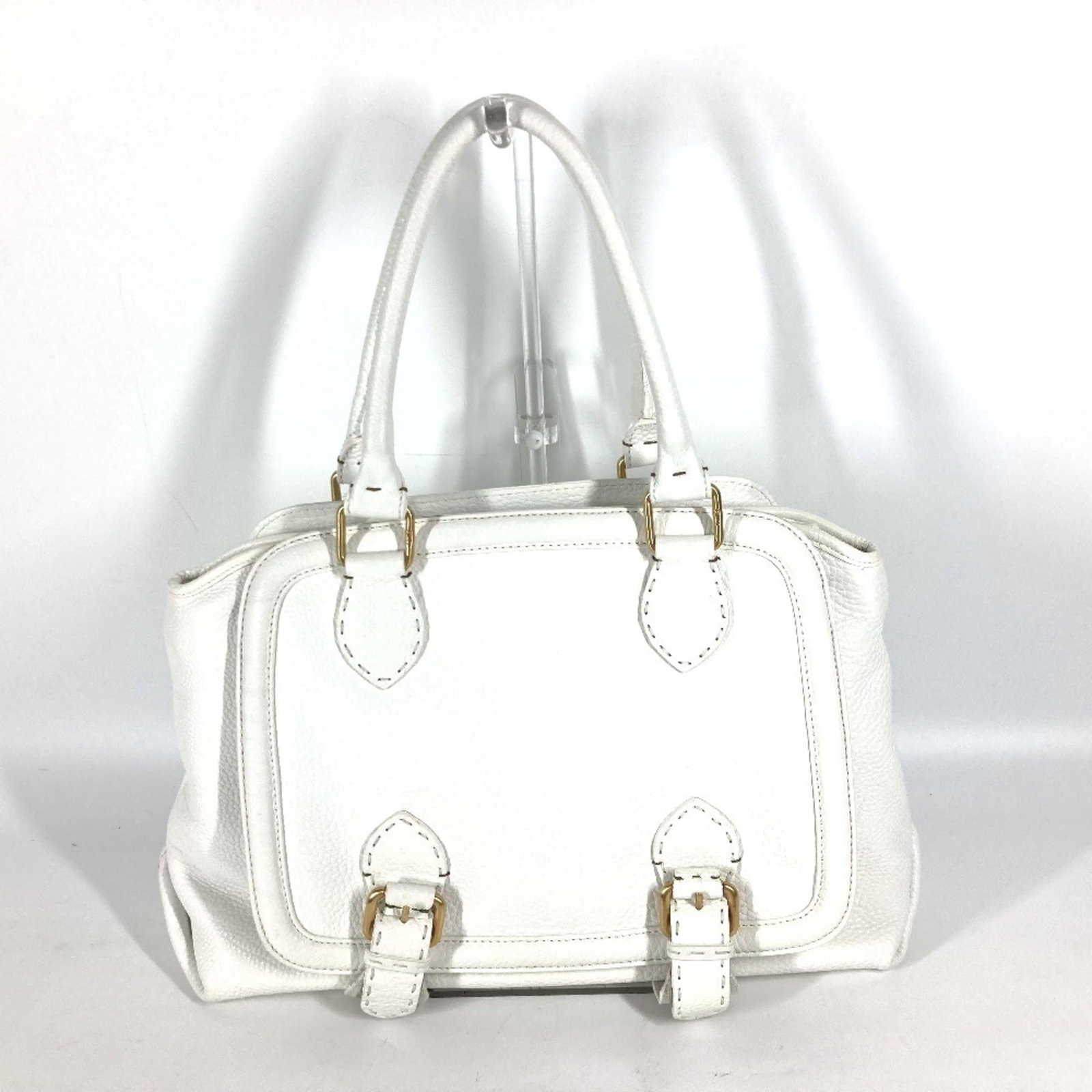 Leather Fendi Shoulder Bag Tote: Leather Fendi Shoulder Bag Tote White leather Fendi shoulder bag tote with clean lines and classic design. Made from high-quality leather, this timeless piece is a stylish addition to any wardrobe.