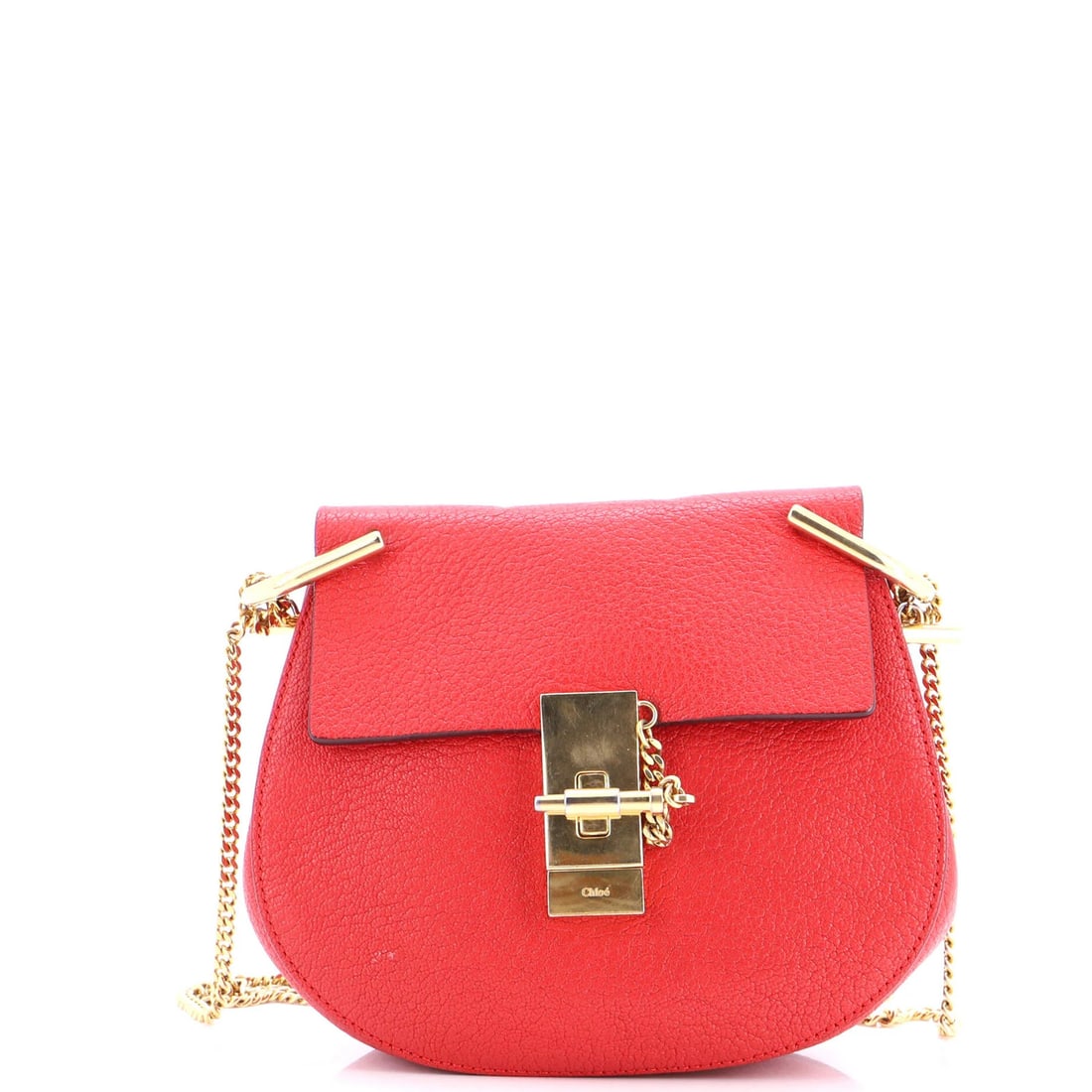 Drew Crossbody Bag Leather Chloe Mini: Drew Crossbody Bag Leather Chloe Mini The Drew Crossbody Bag Leather Chloe Mini is a stylish, mini cross body bag with a bold red exterior made from high-quality leather. Measuring 7" in height and 7.