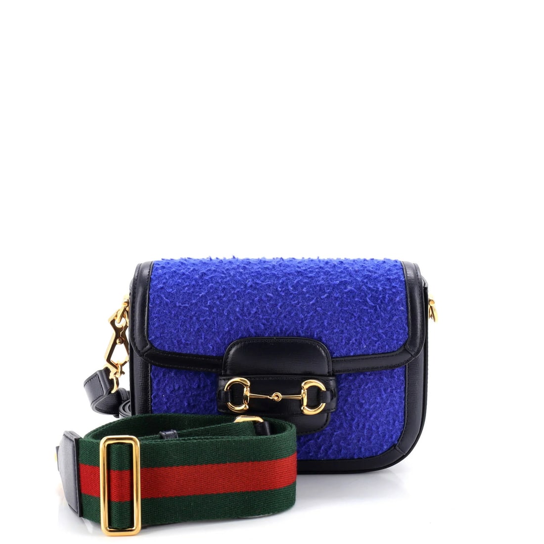 Horsebit wool mini bag 1955 Gucci: Horsebit wool mini bag 1955 Gucci The 1955 Gucci Horsebit Wool Mini is a vintage cross body bag in excellent condition, boasting a striking blue wool exterior with gold hardware. Minor scuffs and edge
