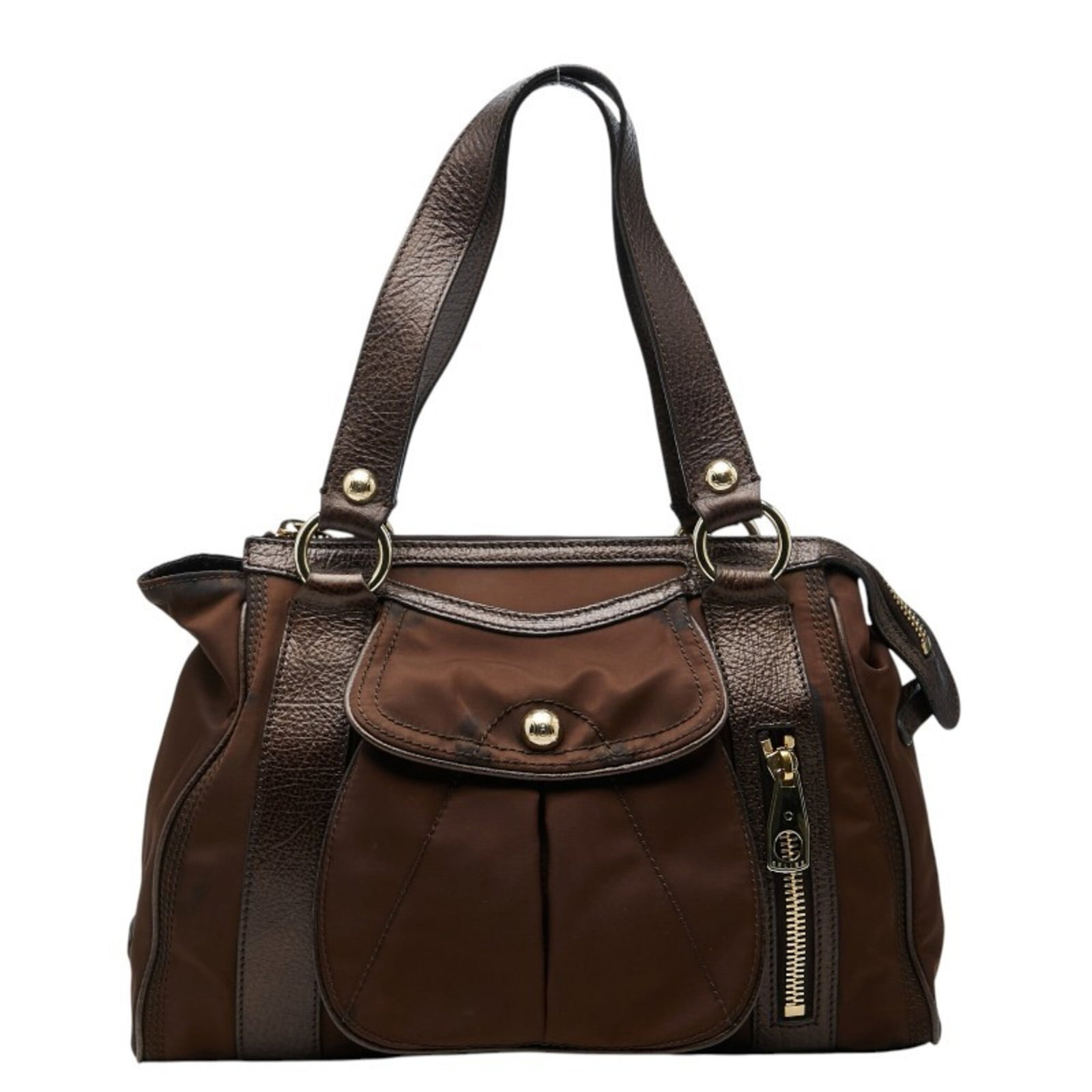 Nylon Leather Celine Handbag: Nylon Leather Celine Handbag Nylon and leather blend in this Celine handbag, available in brown. Measuring 24cm x 34cm x 10cm, it features a unique combination of materials. The bag's dimensions are