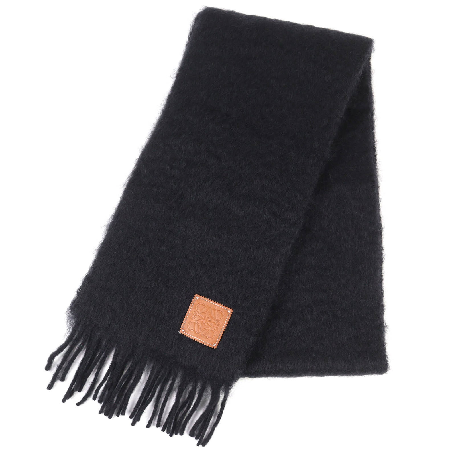 Loewe Stole Mohair Wool 50 48 Nylon: Loewe Stole Mohair Wool 50 48 Nylon Stole from renowned Spanish fashion house Loewe, this luxurious piece boasts a striking black color and a unique blend of mohair, wool, and nylon materials. Measuri