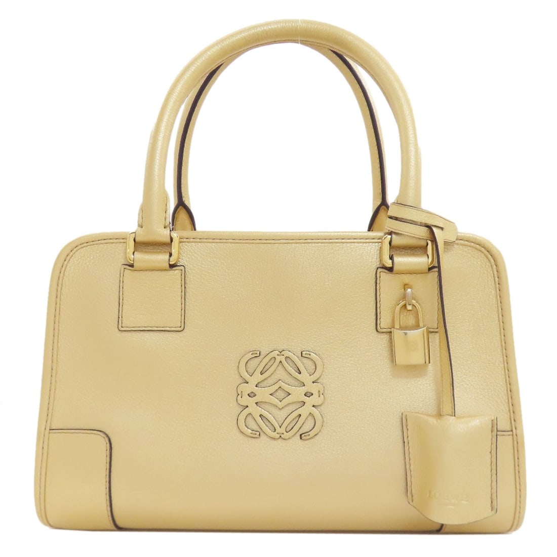 Calf Handbag Loewe Amazona: Calf Handbag Loewe Amazona Gold calf handbag with a 6.7 inch height and 10.6 inch width, featuring a signature and a zip closure, made from high-quality calf material. This LOEWE Amazona handbag