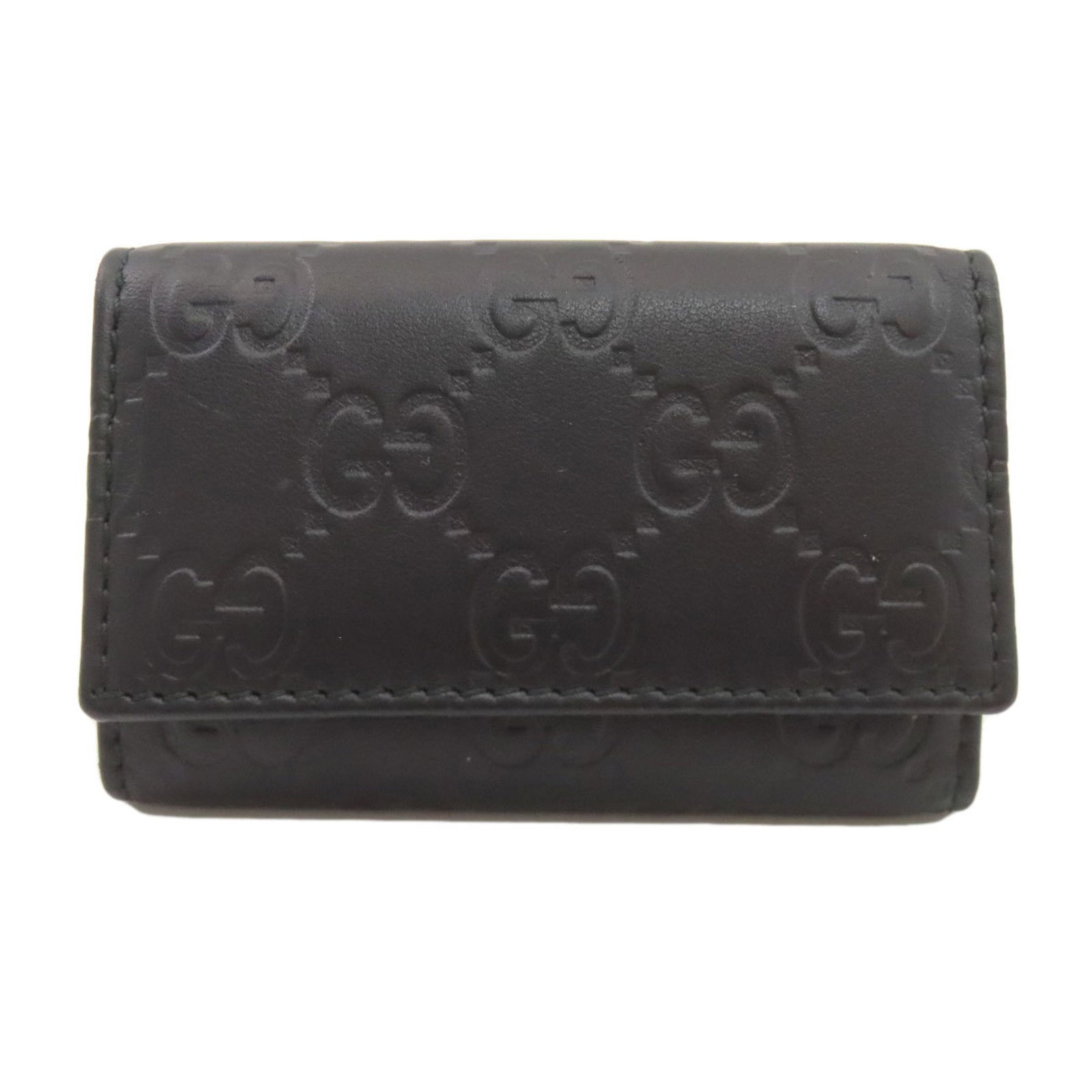 Keycase Leather Gucci: Keycase Leather Gucci Black leather keycase with 6 key hooks, measuring 6cm x 9.5cm x 2cm. Made from high-quality leather, this Gucci keycase is a compact and stylish accessory. Item Specifics: