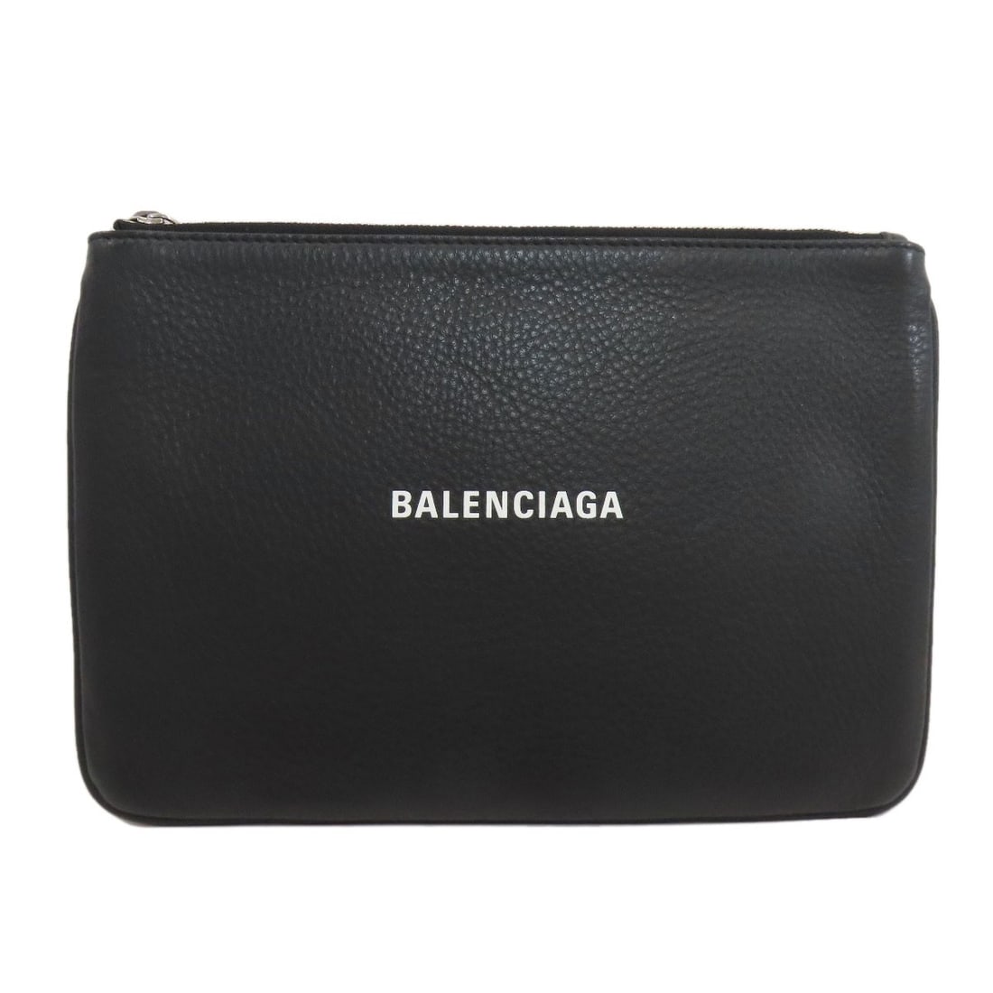 Balenciaga 551992 Logo Accessory Pouch Leather: Balenciaga 551992 Logo Accessory Pouch Leather Black leather accessory pouch from Balenciaga, featuring the iconic logo. Made from high-quality leather, this sleek pouch is a stylish addition to any