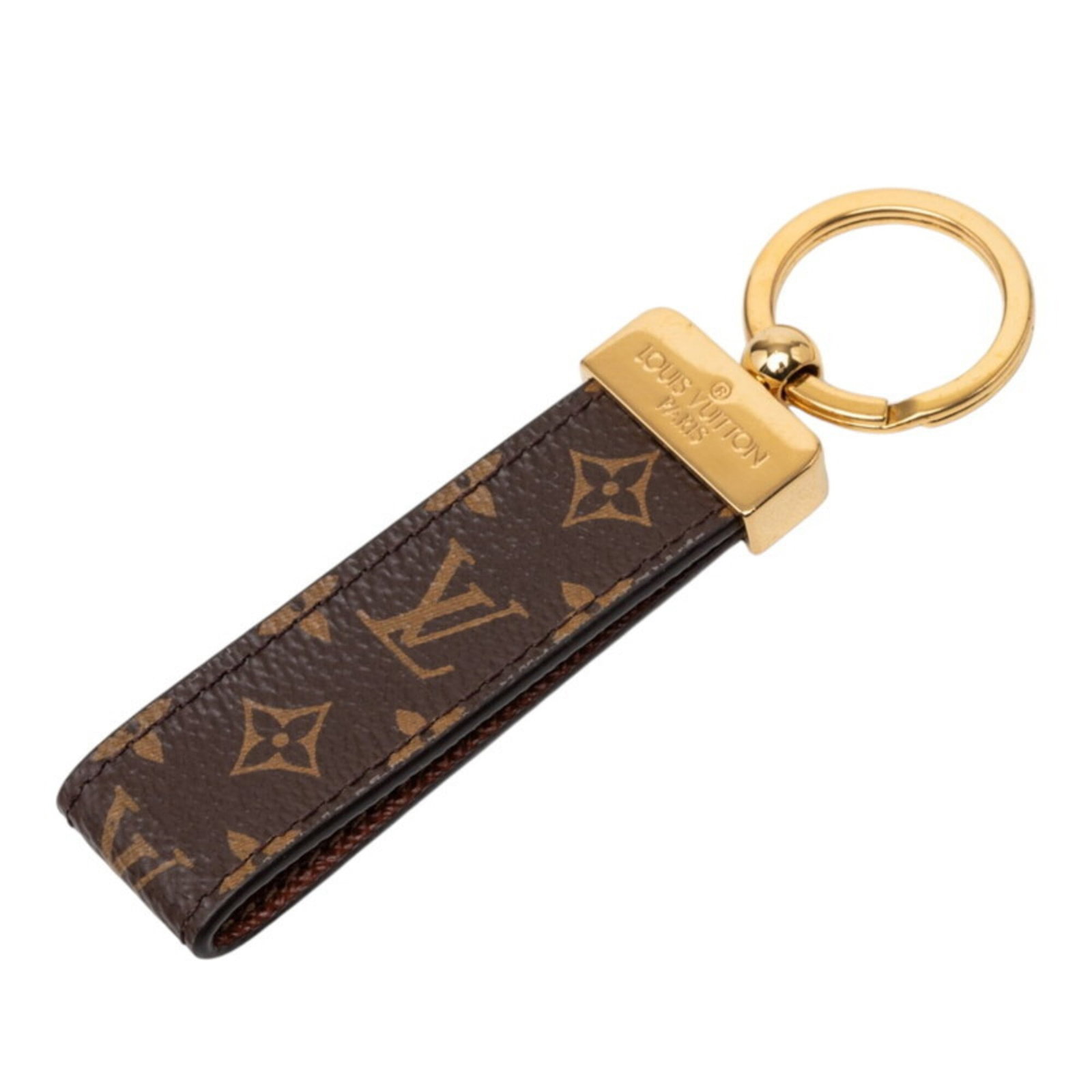 Keyring from Louis Vuitton: Keyring from Louis Vuitton Brown and gold accents add a touch of elegance to this Louis Vuitton keyring, measuring 10.5cm in length. The classic design features a timeless combination of materials,
