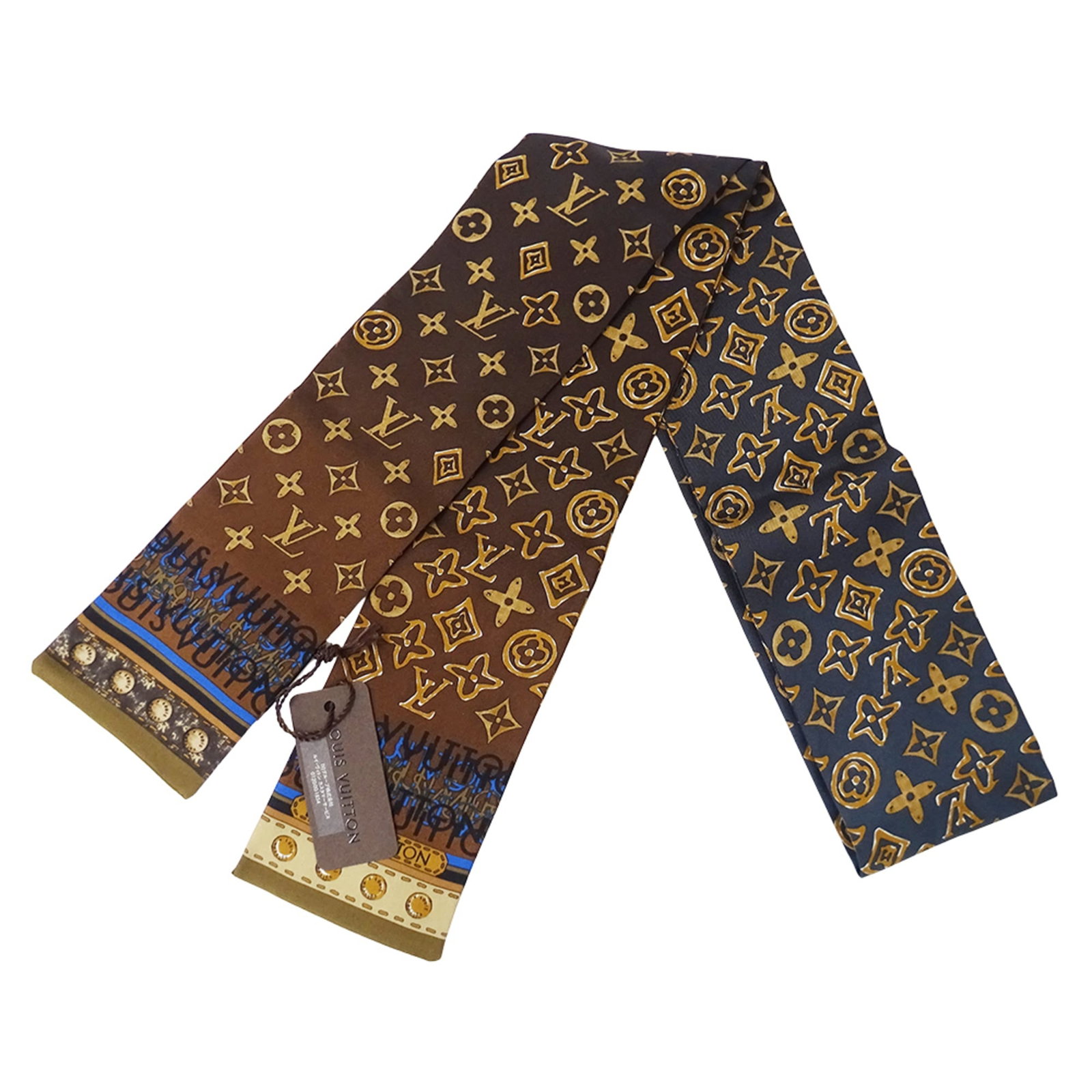 Silk Scarf Louis Vuitton: Silk Scarf Louis Vuitton Silk Scarf from Louis Vuitton's iconic Monogram collection, crafted from high-quality silk in a rich brown hue and navy accents, measuring 1.2m x 8cm. This luxurious scarf