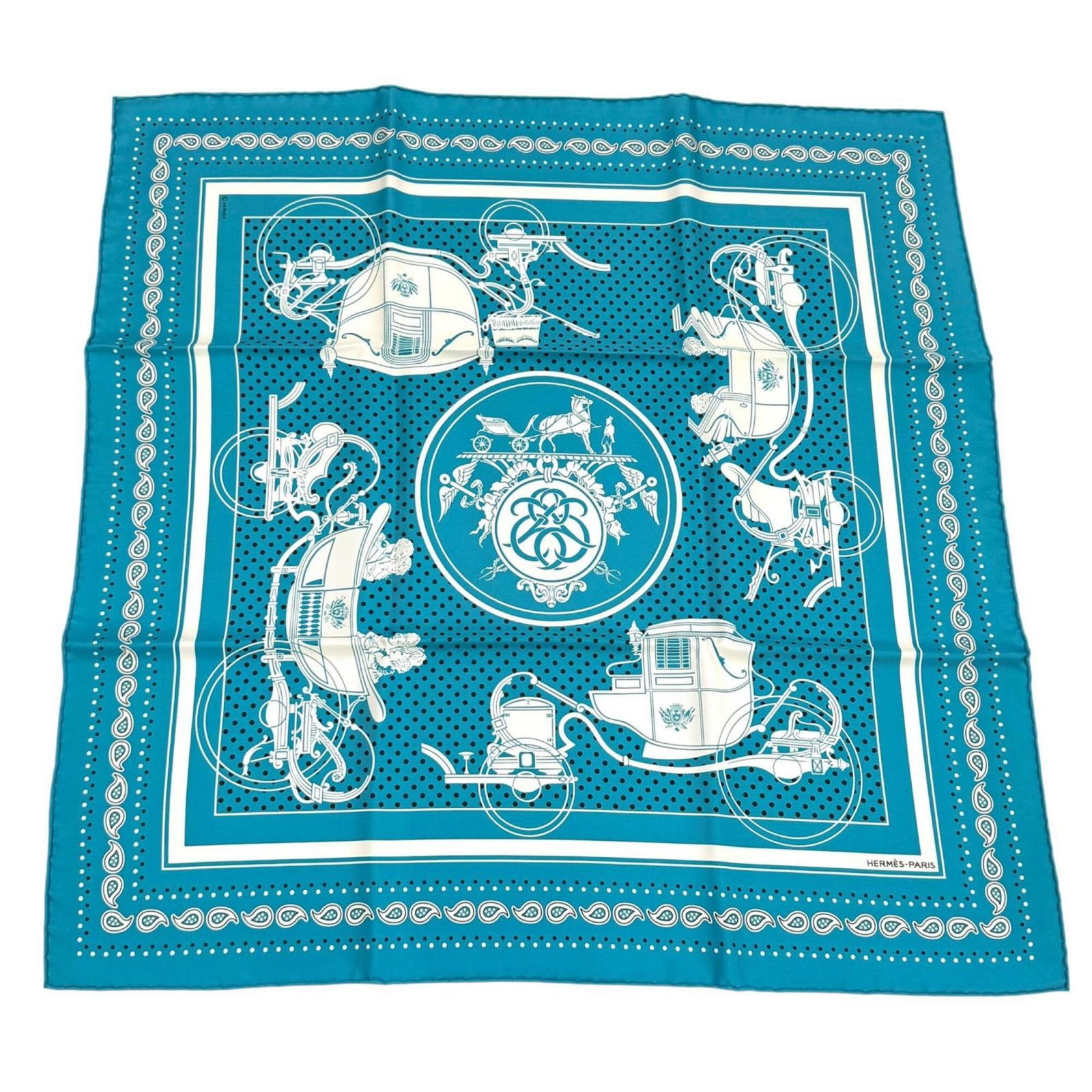 Silk Hermes Scarf: Silk Hermes Scarf Silk from France, this 55.5cm x 55.5cm turquoise scarf is made from high-quality silk material. The scarf bears a signature, and its vibrant turquoise color is a striking feature. A