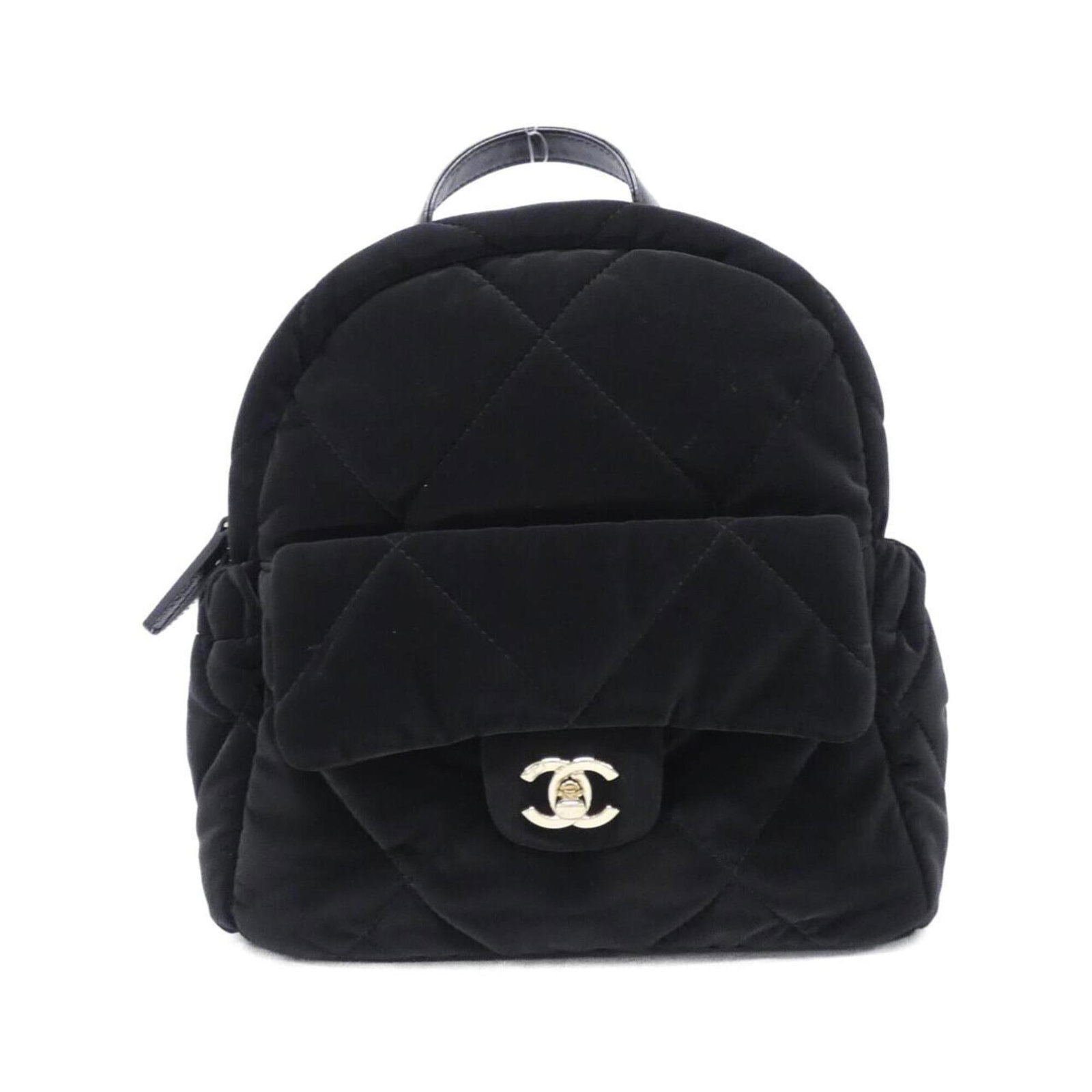 Velvet Nylon Chanel Backpack: Velvet Nylon Chanel Backpack Velvet Nylon Chanel Backpack in Black. This stylish backpack features a unique combination of velvet and nylon materials, with a sleek black finish. Measuring 24cm x 24cm 