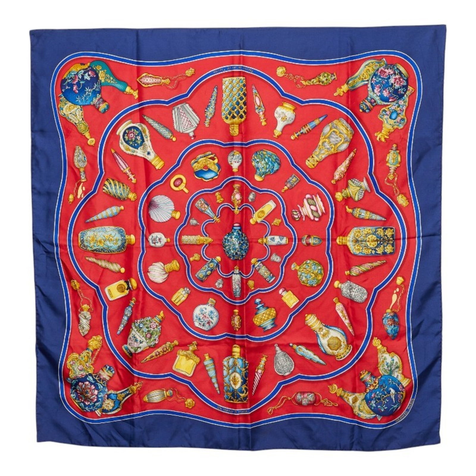 Silk Hermes Scarf: Silk Hermes Scarf Silk from the renowned French fashion house, this Hermes scarf boasts a vibrant blue and multi-color design, accompanied by a bold red accent. Made from high-quality silk, the scarf