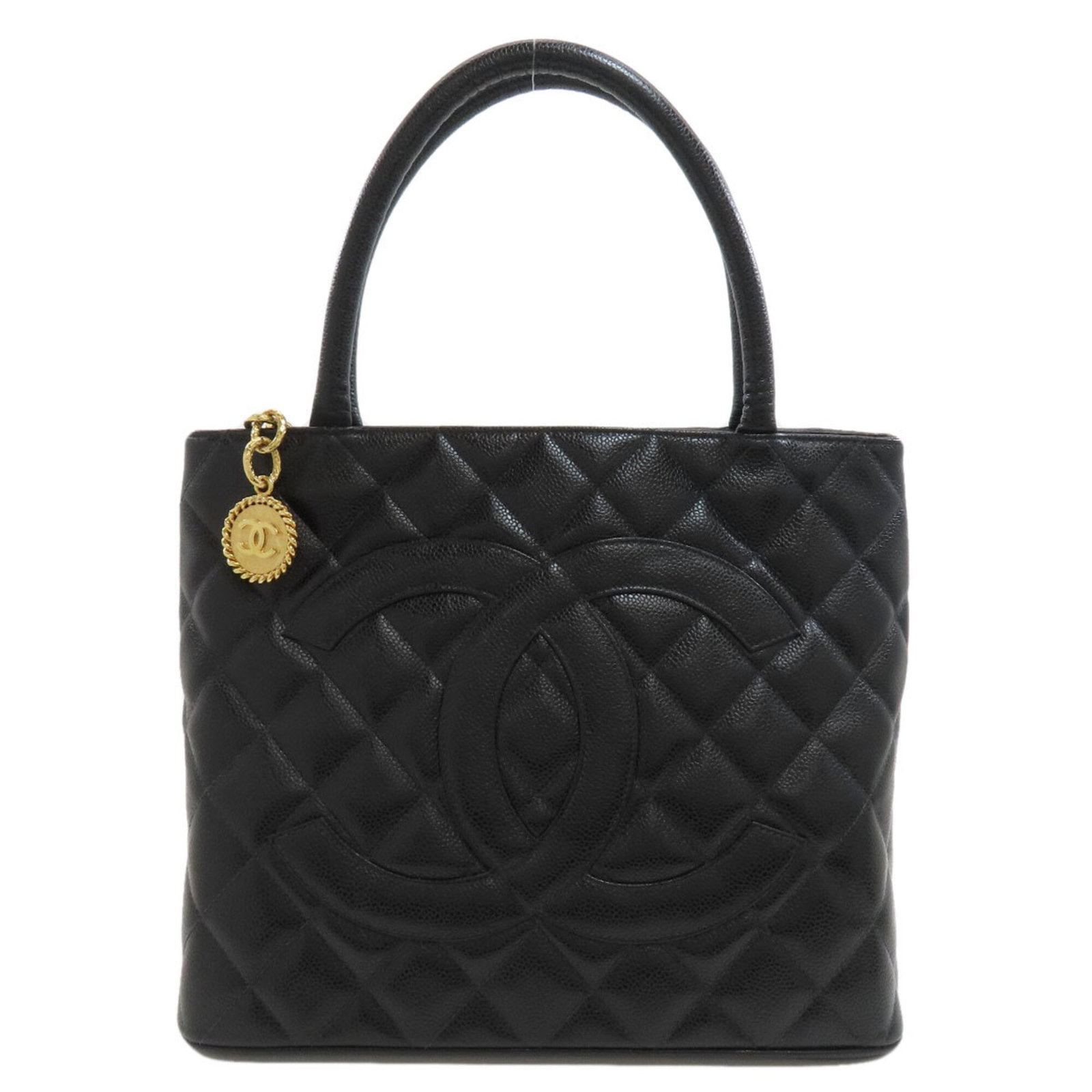 Leather Chanel Tote Bag: Leather Chanel Tote Bag Black leather Chanel tote bag with a zipper closure, featuring a single zipper pocket and open pocket, measuring 24.5cm x 30cm x 15cm. The bag has a 36cm long handle and a