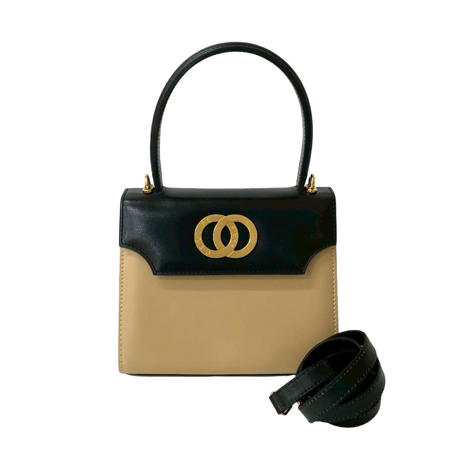 Handbag Leather Shoulder Bag Celine: Handbag Leather Shoulder Bag Celine Celine's Handbag Leather Shoulder Bag boasts a timeless design with a rich, high-quality leather finish in beige and black hues. The bag's classic style is compleme