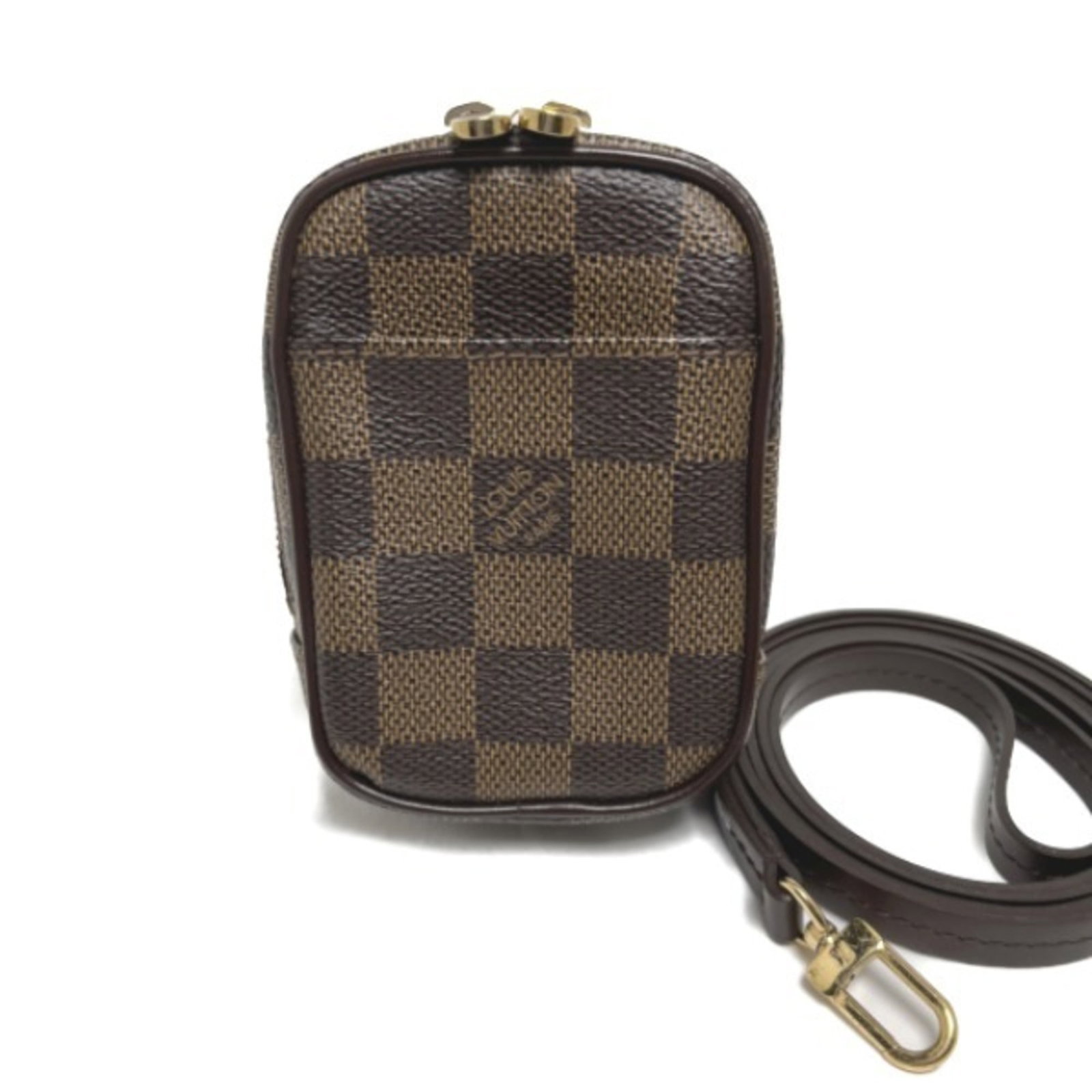 Canvas Damier Pouch Louis Vuitton: Canvas Damier Pouch Louis Vuitton Damier canvas pouch in classic brown, measuring 11.5cm x 7.5cm x 4cm, a timeless accessory from Louis Vuitton. This iconic design features the signature Damier patter