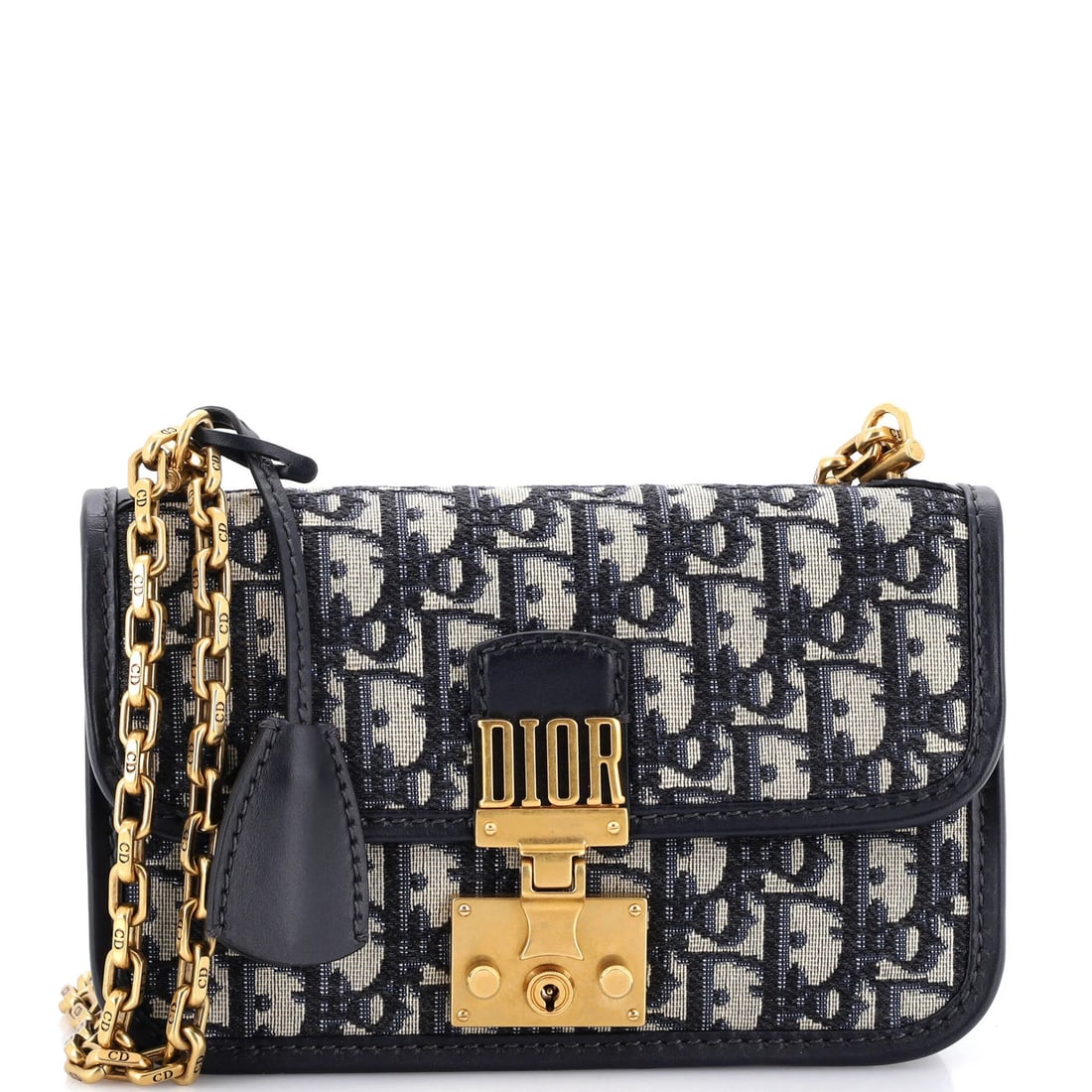 Christian Dior Dioraddict Medium Flap Canvas Oblique Bag: Christian Dior Dioraddict Medium Flap Canvas Oblique Bag The Christian Dior Dioraddict Medium Flap Canvas Oblique Bag boasts a striking blue canvas exterior with a classic oblique design. Measuring