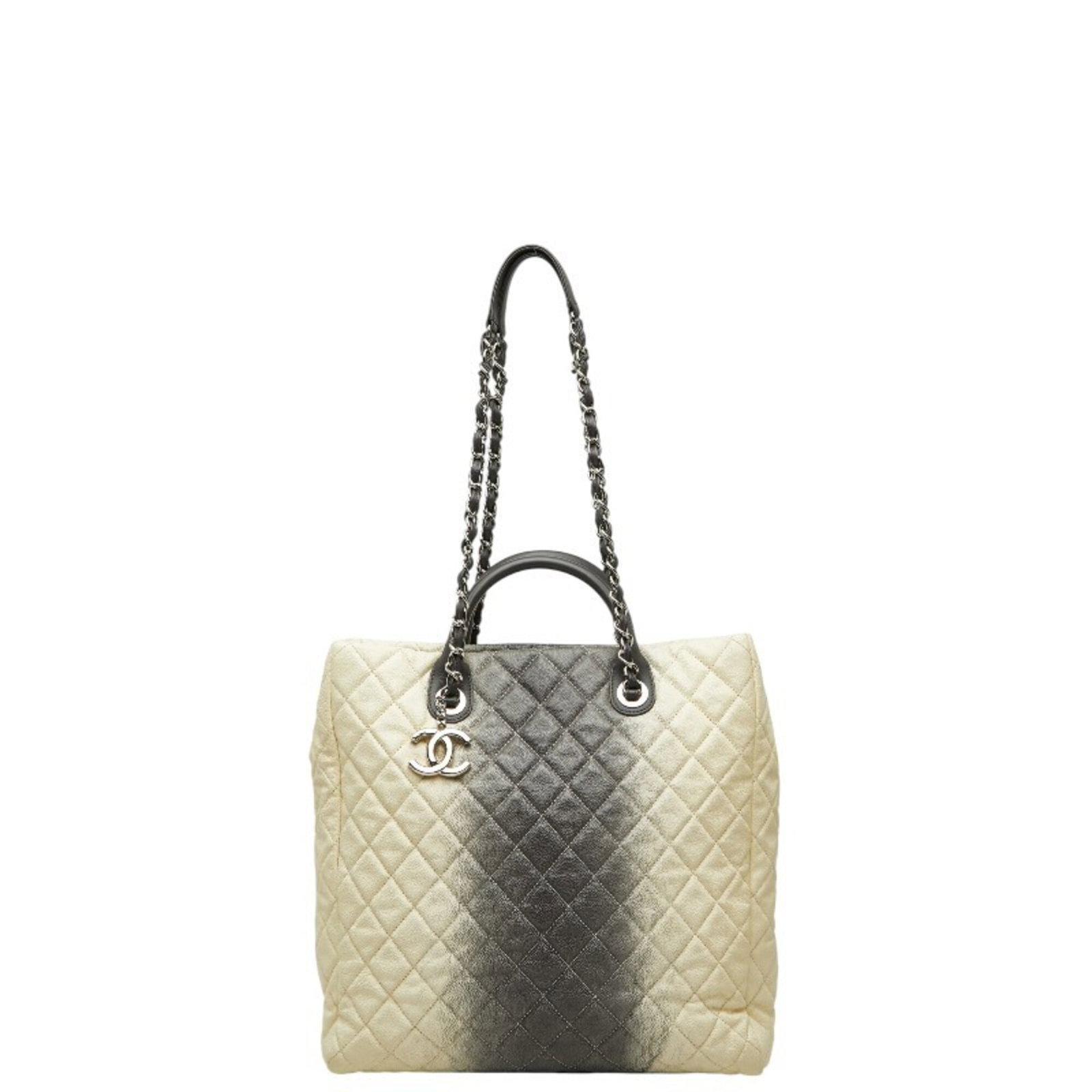 Calfskin Grained Chanel Bag Shoulder: Calfskin Grained Chanel Bag Shoulder Black and ivory calfskin shoulder bag with silver hardware, featuring a classic Chanel design. This 32cm x 35cm x 12cm bag is a timeless piece that combines style