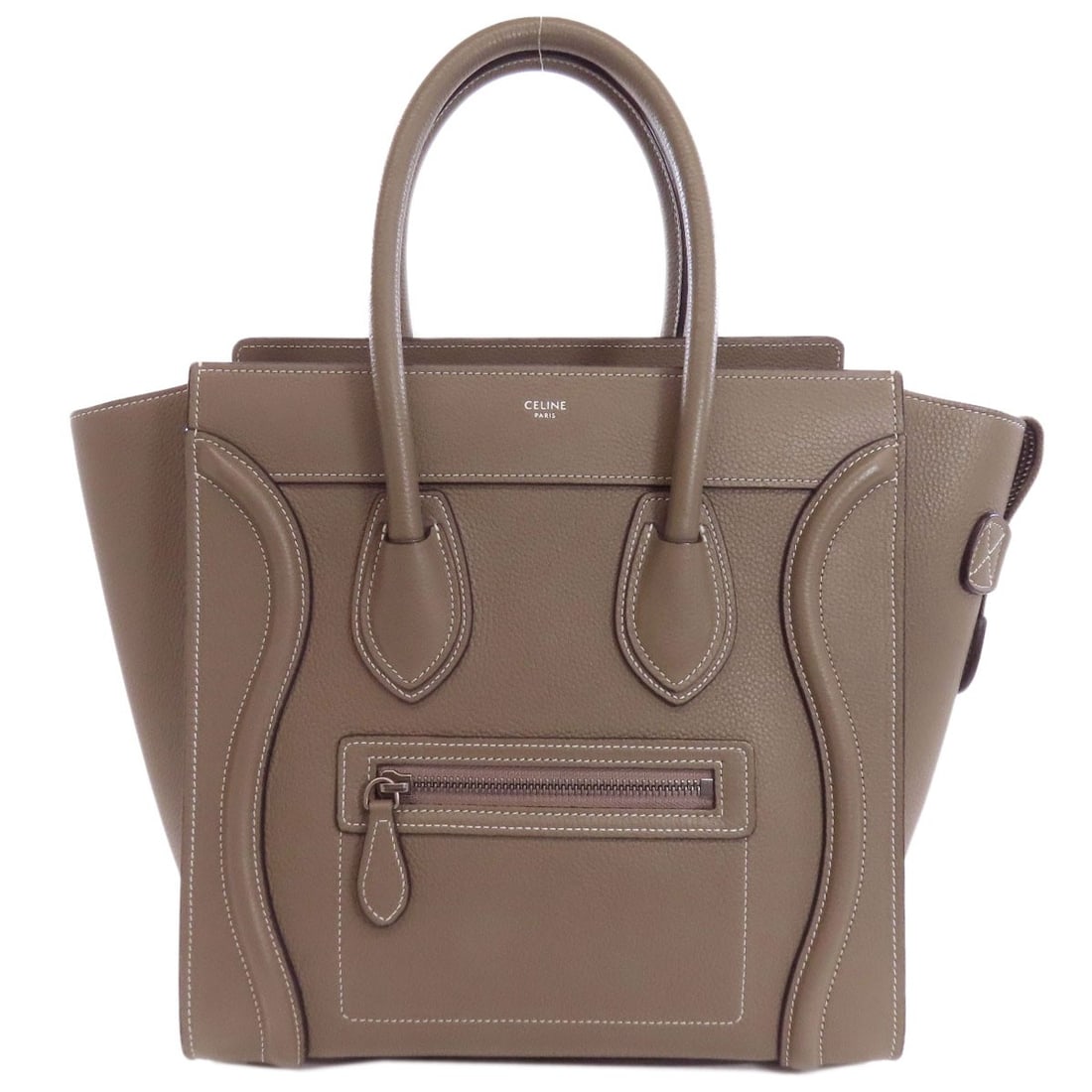 Calf Micro Luggage Tote Bag Celine: Calf Micro Luggage Tote Bag Celine Calf Micro Luggage Tote Bag Celine is made from Calf exterior material, a notable feature of this bag. The bag's exterior color is Brown, a classic and timeless
