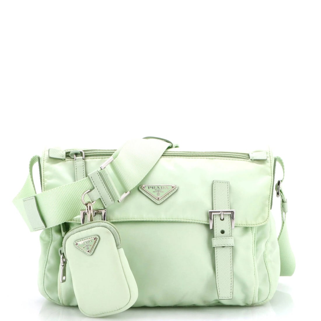 Buckle Flap Messenger Bag Prada Double Re Nylon Medium: Buckle Flap Messenger Bag Prada Double Re Nylon Medium The Prada Double Buckle Flap Messenger Bag in medium size boasts a striking green exterior made from durable Re-Nylon material, complemented by a