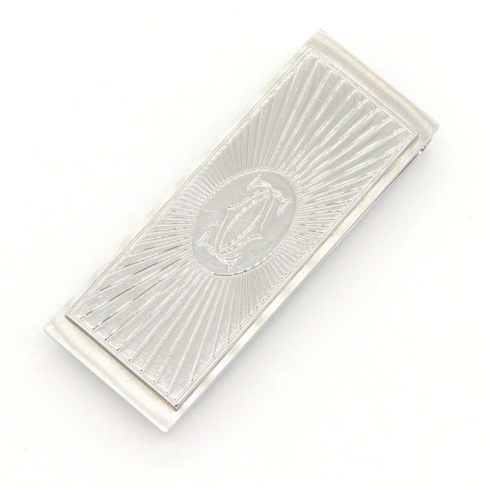 Metal Money Clip Cartier: Metal Money Clip Cartier Cartier's C de Cartier metal money clip is a sleek and sophisticated accessory, crafted from high-quality silver metal. Measuring 5cm x 1.9cm, this compact clip is designed to