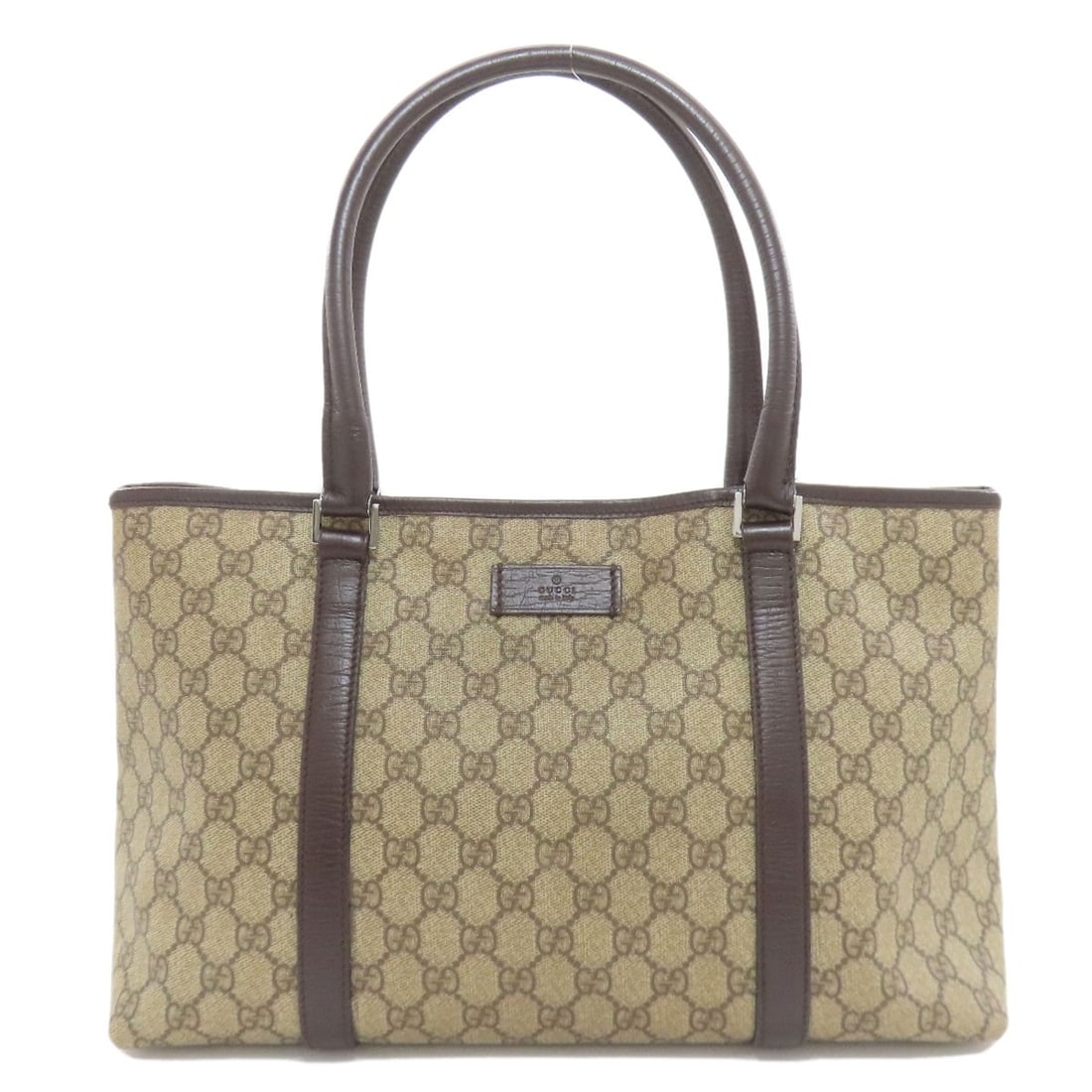 Pvc Bag Supreme Tote Gucci 114595: Pvc Bag Supreme Tote Gucci 114595 Brown PVC Gucci Tote Bag with Brown Exterior. This Gucci tote bag features a unique PVC exterior and a classic design. The bag's brown color and PVC material make it