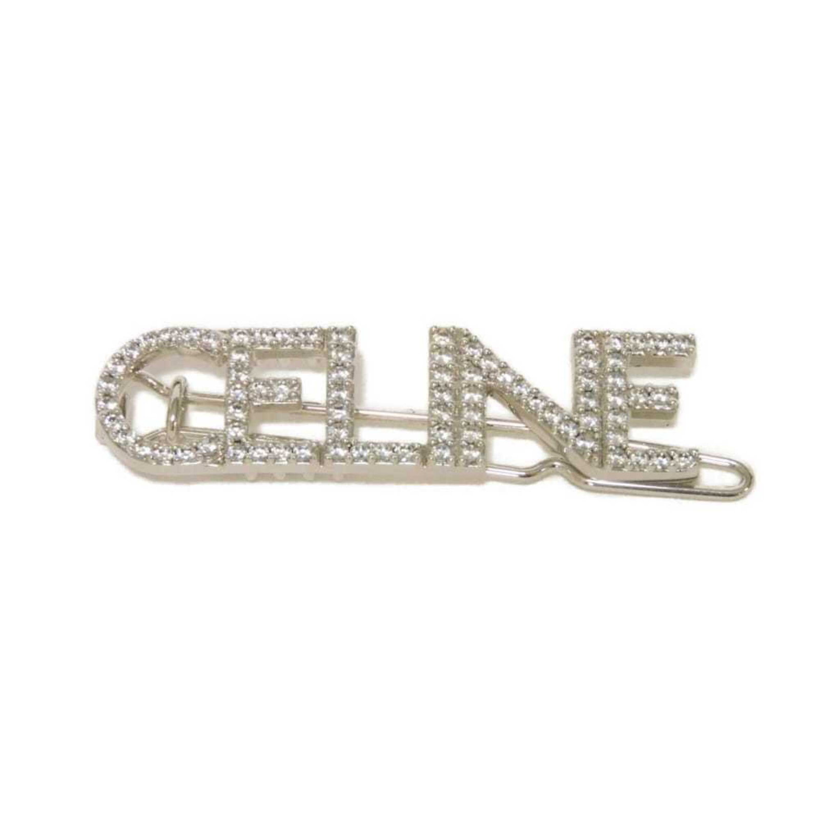 Barrette Celine: Barrette Celine The Celine barrette is a sleek and modern hair accessory, featuring a clear and silver design with a compact size of 1.1cm x 4.5cm. Its clear and silver color combination adds a touch 