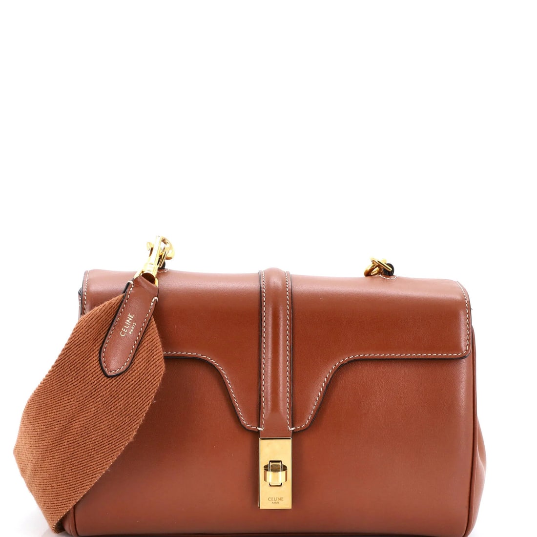 Calfskin Teen Bag Soft 16 Celine: Calfskin Teen Bag Soft 16 Celine Soft 16 Calfskin Teen Bag from Celine features a smooth, brown leather exterior with suede and leather interior, gold hardware, and a classic shoulder bag design. The