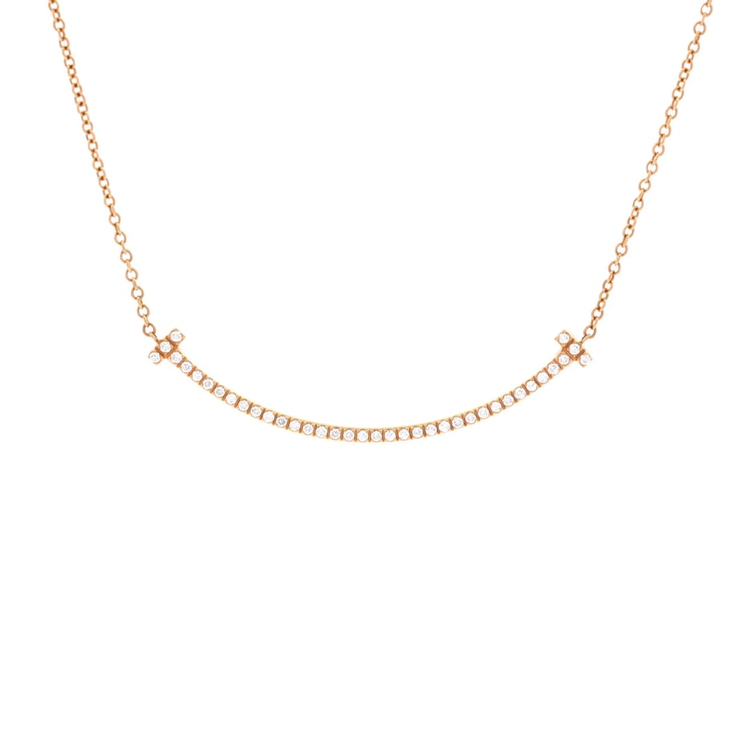 Tiffany Co T Smile Pendant Necklace 18K Rose Gold Diamonds Small: Tiffany Co T Smile Pendant Necklace 18K Rose Gold Diamonds Small Tiffany & Co.'s T Smile Pendant Necklace is a stunning 18K rose gold piece adorned with small diamonds, measuring 15.75 inches in