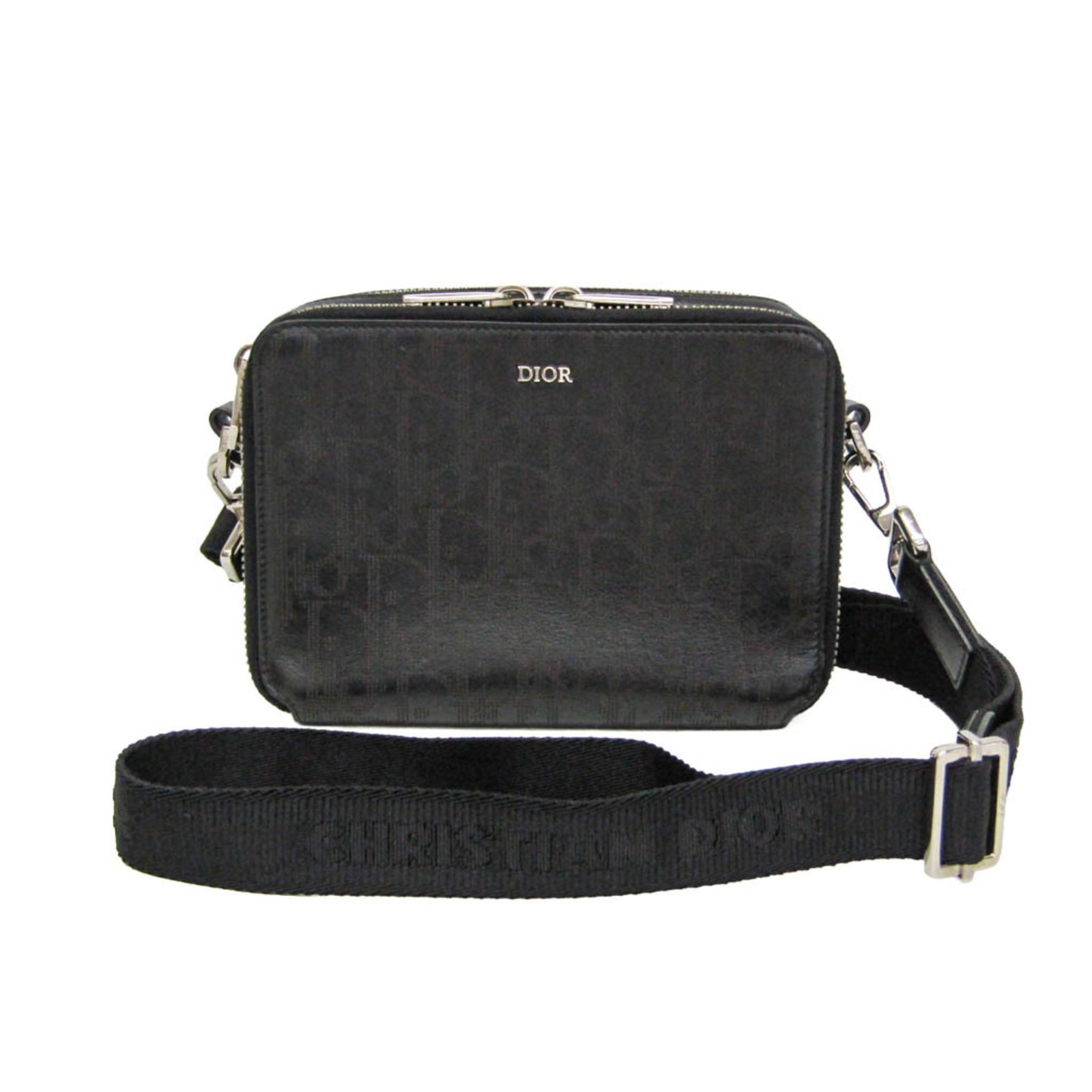Shoulder Bag Leather Christian Dior: Shoulder Bag Leather Christian Dior Black leather shoulder bag from Christian Dior's Oblique Galaxy collection, featuring punching leather and a zipper closure. The bag includes an open pocket and