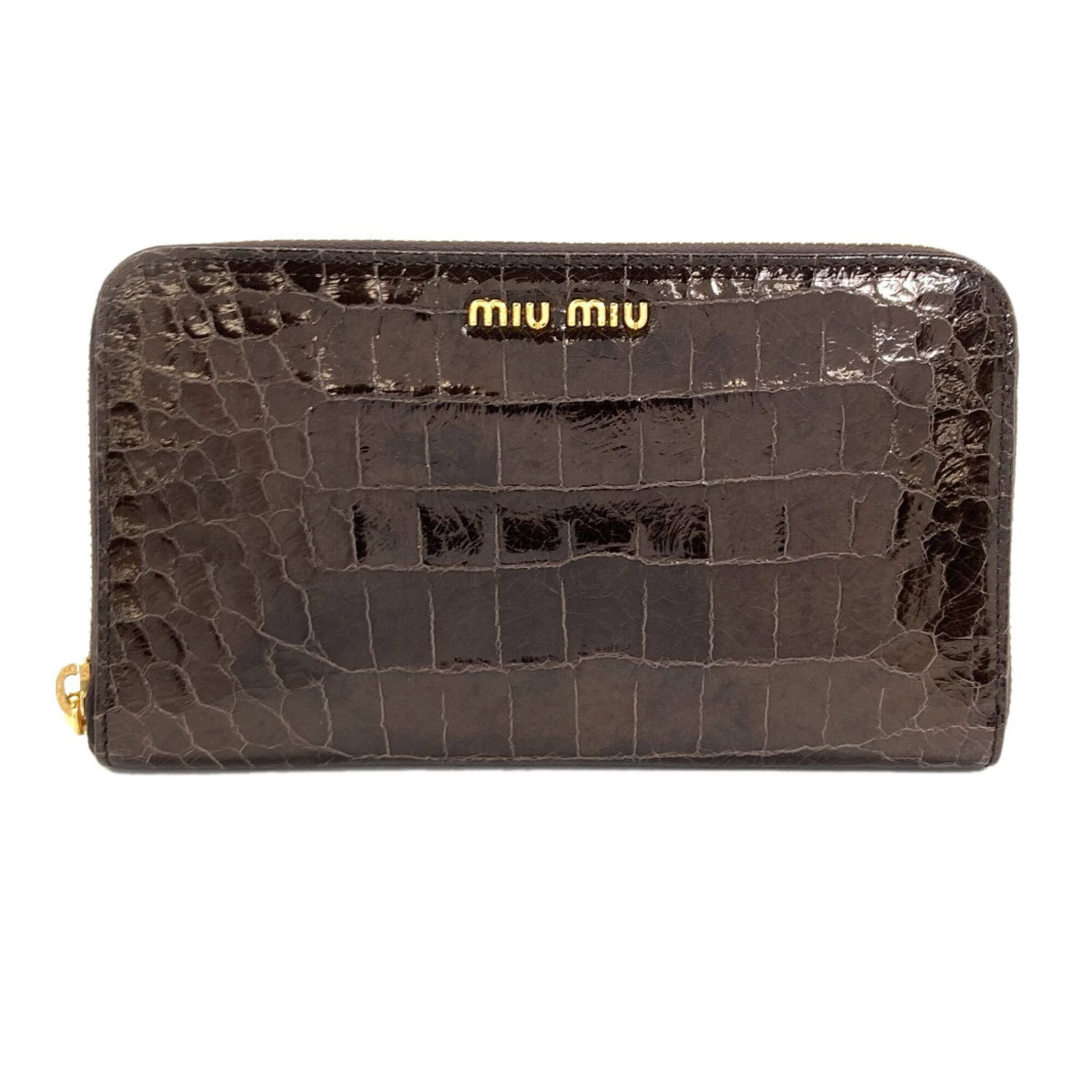 Miu Long Wallet (Bi-Fold) Leather: Miu Long Wallet (Bi-Fold) Leather Black Miu Miu bi-fold leather wallet with a sleek 10cm x 18cm x 2cm design, perfect for everyday carry. This stylish wallet features high-quality leather