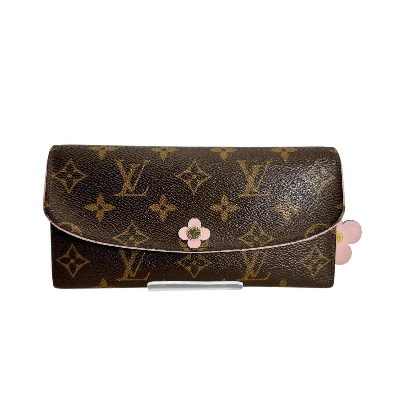 Vuitton Louis Monogram Canvas Bi fold Wallet Long: Vuitton Louis Monogram Canvas Bi fold Wallet Long The Louis Vuitton Monogram Canvas Bi-fold Wallet Long is a stylish and functional accessory, featuring the iconic Louis Vuitton monogram canvas