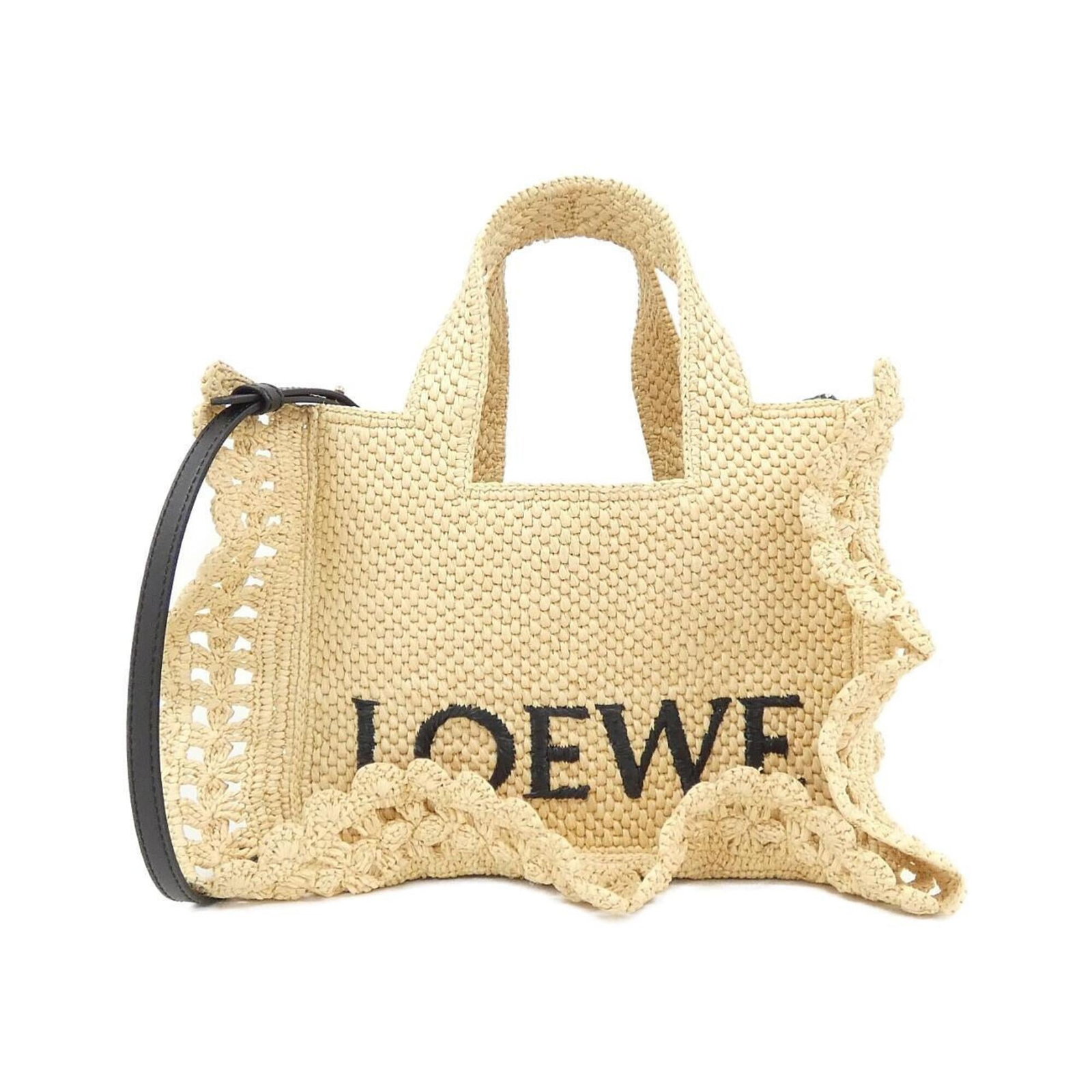 Loewe Handbag Raffia Viscose Leather Tote: Loewe Handbag Raffia Viscose Leather Tote Loewe's Raffia Viscose Leather Tote boasts a unique combination of materials, featuring calfskin leather, raffia, and viscosse. The beige color adds a touch o