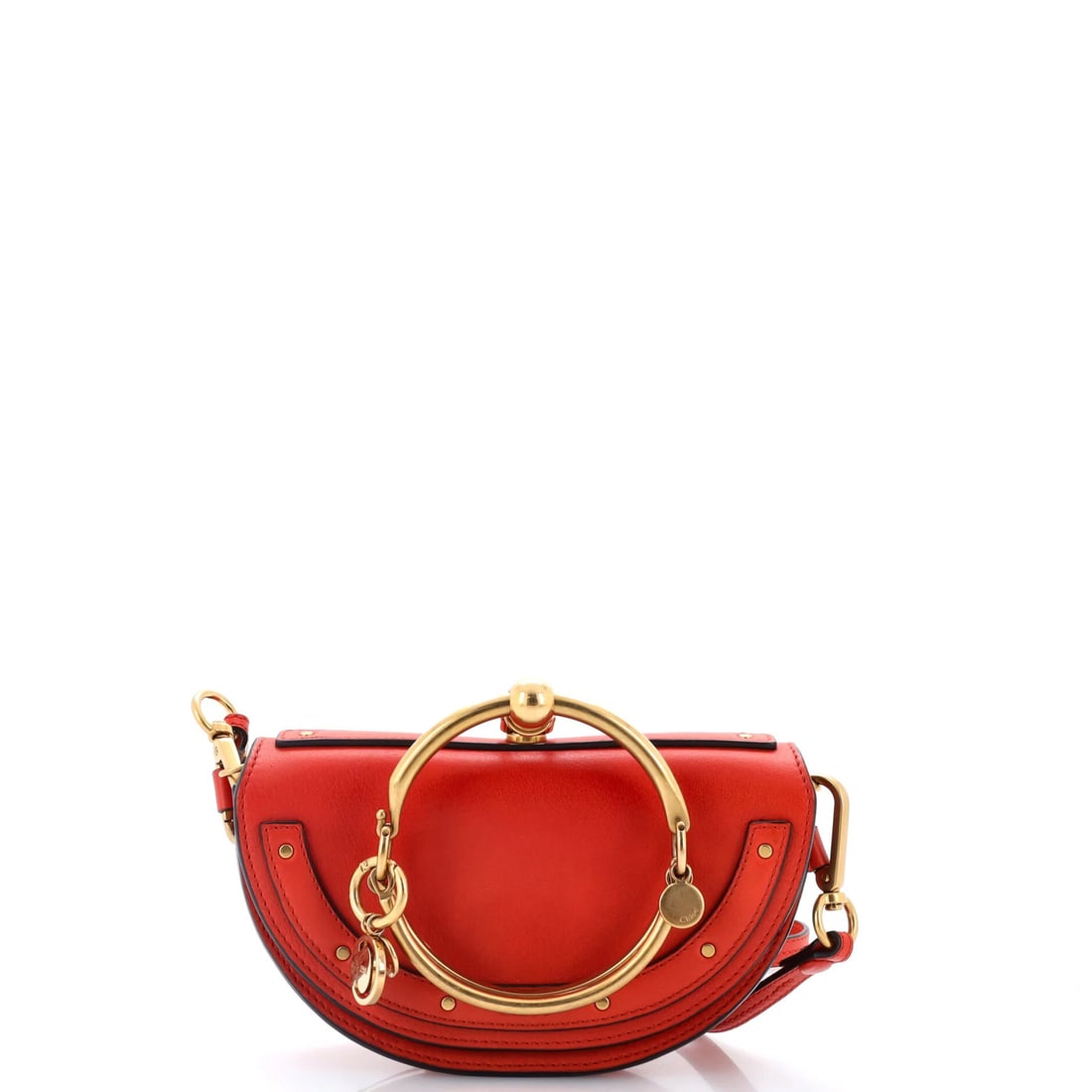 Chloe Nile Crossbody Bag Leather Mini: Chloe Nile Crossbody Bag Leather Mini The Chloe Nile Crossbody Bag Leather Mini boasts a sleek blue leather exterior with a neutral interior, complemented by aged gold hardware. Measuring 4.5" tall