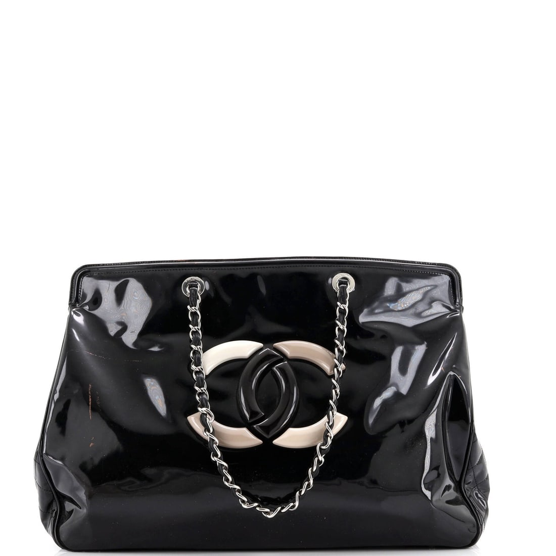 Patent Vinyl XL Chanel Tote Lipstick: Patent Vinyl XL Chanel Tote Lipstick Patent Vinyl XL Chanel Tote Lipstick is a unique and eye-catching accessory featuring a patent vinyl exterior in black. With a sizeable 17" width and 12" height,