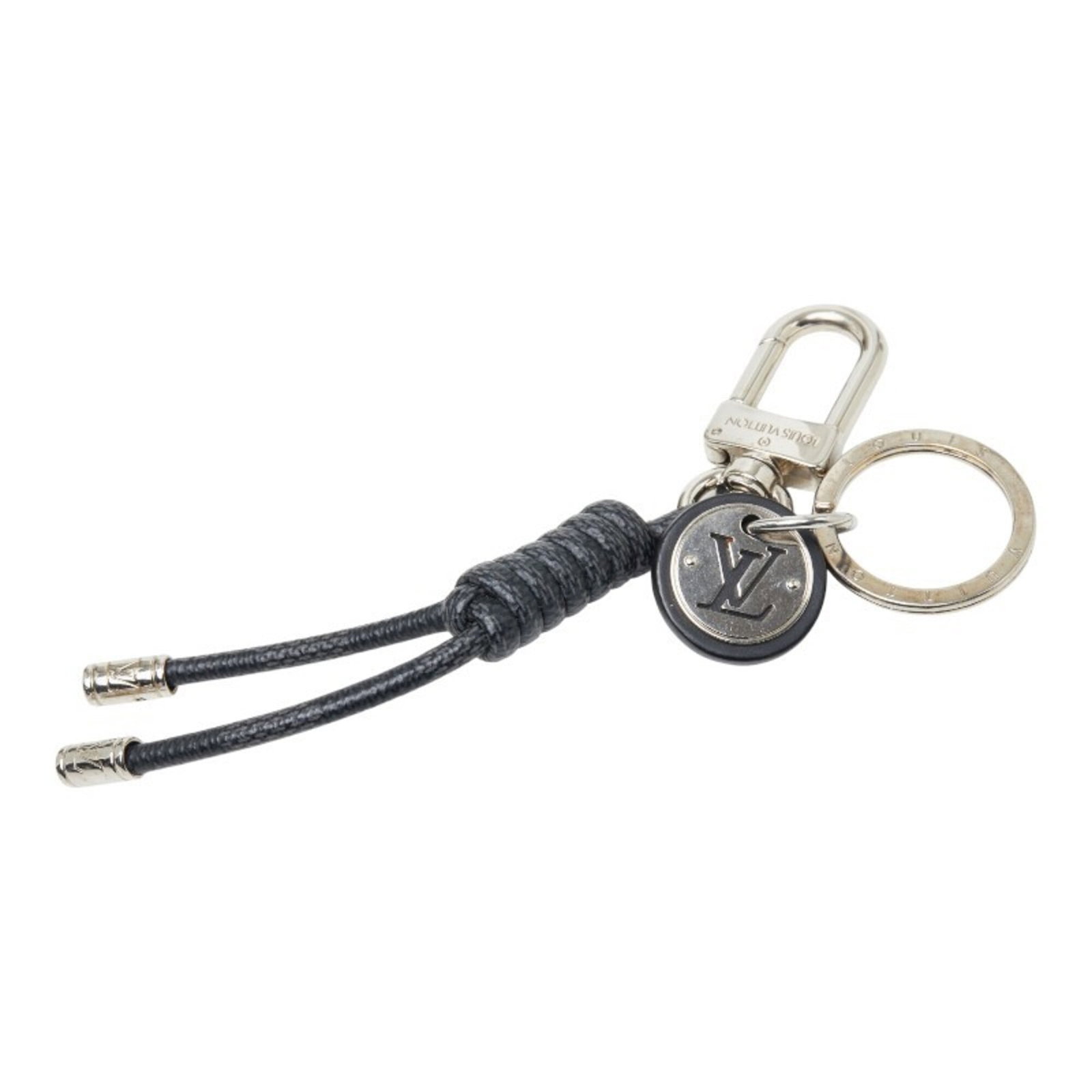 Vuitton Metal Louis Keyring: Vuitton Metal Louis Keyring Metal keyring with Louis Vuitton logo, made from metal, measuring 11cm x 1.5cm. This keyring features the iconic Louis Vuitton design, a classic accessory for everyday