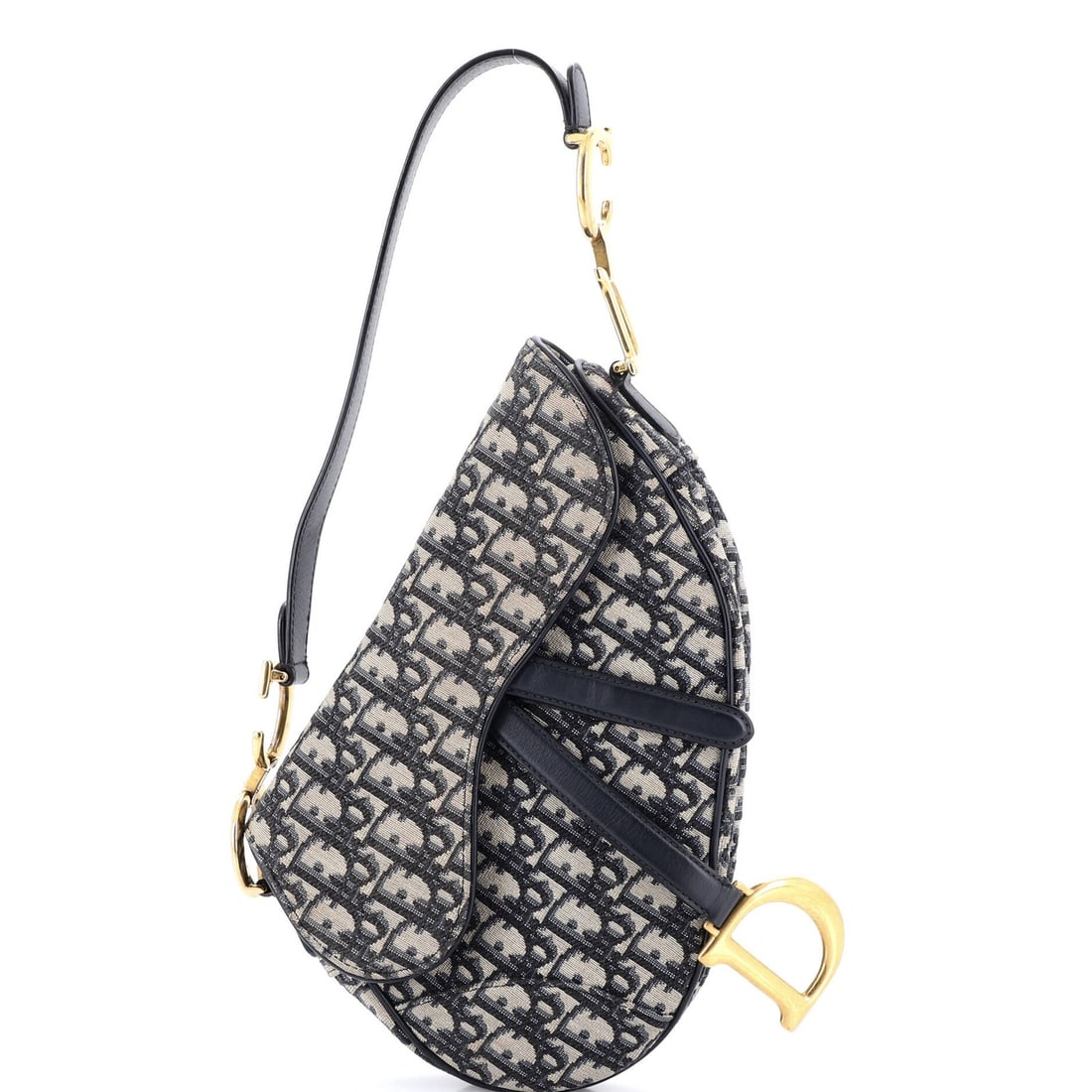 Canvas Oblique Medium Saddle Handbag Dior Christian: Canvas Oblique Medium Saddle Handbag Dior Christian Canvas Oblique Medium Saddle Handbag Dior. This Dior Saddle Handbag features a striking blue canvas exterior with an oblique design, adding a touch