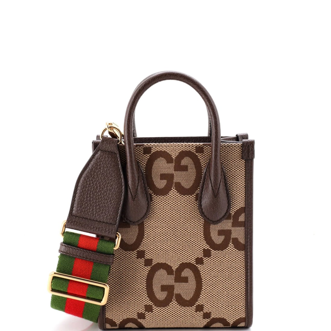 GG Canvas Mini Tote Vertical Gucci Jumbo: GG Canvas Mini Tote Vertical Gucci Jumbo The GG Canvas Mini Tote Vertical Gucci Jumbo is a stylish and compact cross-body bag featuring Gucci's iconic GG Canvas design in a classic brown color. Measur