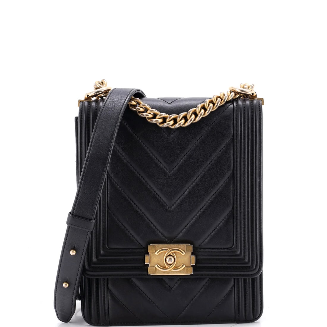 Small Chevron Lambskin Boy Bag North South Flap Chanel: Small Chevron Lambskin Boy Bag North South Flap Chanel Small Chevron Lambskin Boy Bag with North South Flap in Black Leather. This compact cross-body bag features a striking chevron design in black