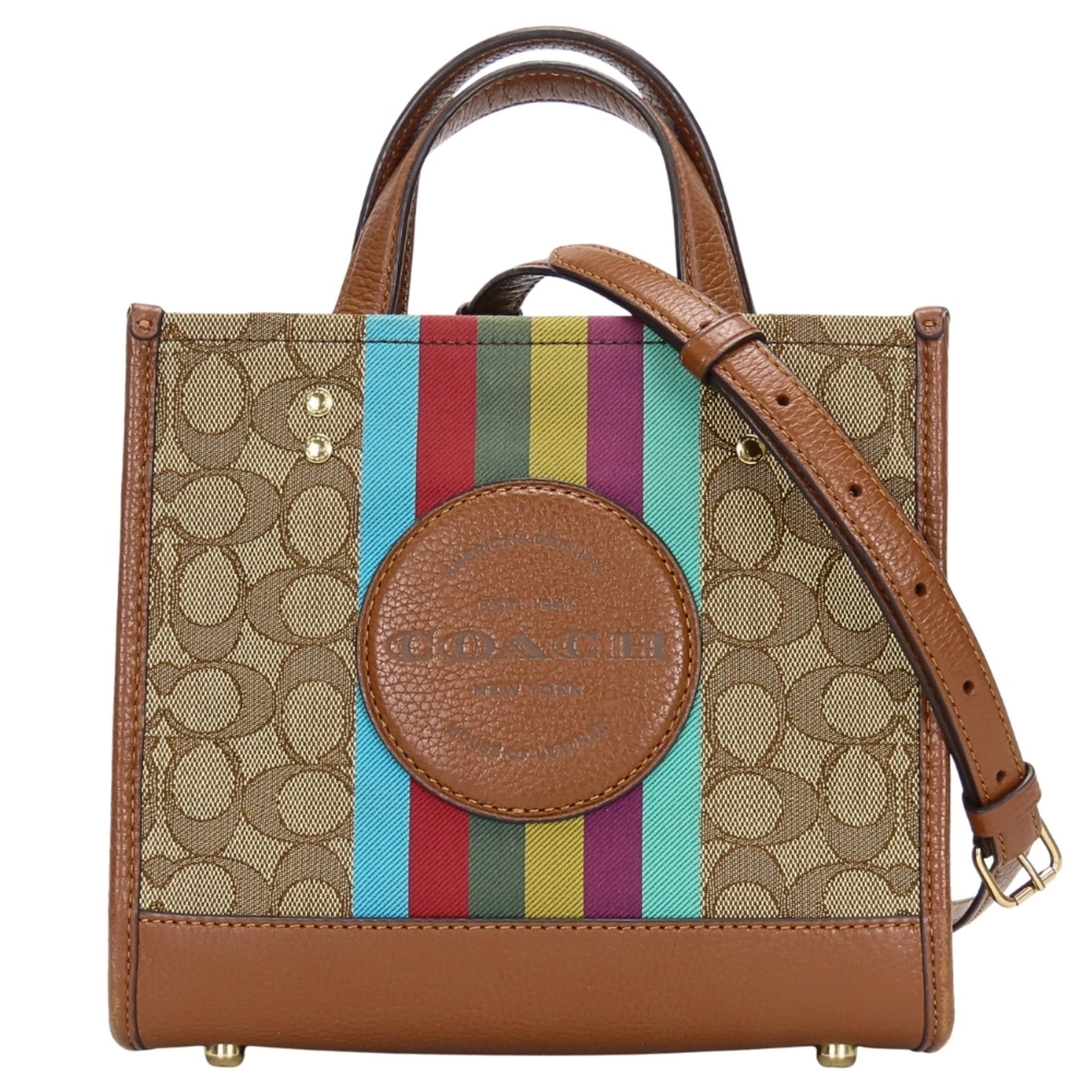 Handbag Canvas Leather Coach: Handbag Canvas Leather Coach Canvas and leather combine in this versatile handbag, available in a rich brown and gray color. The zipper closure and casual design make it perfect for everyday use. Meas