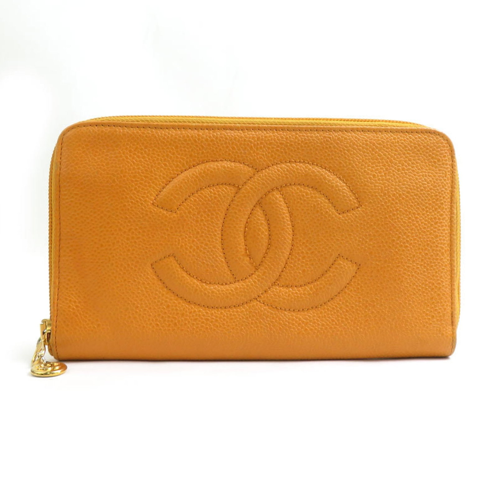 Chanel Long Wallet (Bi-Fold) Grained Calfskin: Chanel Long Wallet (Bi-Fold) Grained Calfskin Chanel's iconic bi-fold design is showcased in this elegant long wallet crafted from high-quality grained calfskin leather. The subtle orange hue adds a t