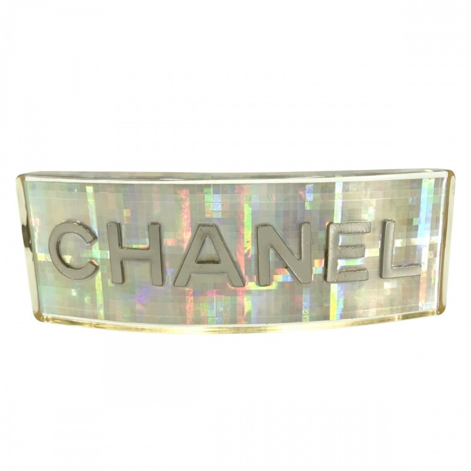 Barrette Chanel: Barrette Chanel Clear, multi-color barrette with a sleek design, measuring 3.3cm x 9.5cm and weighing 44g. This stylish accessory features a clear, multi-colored structure that adds a pop of color to
