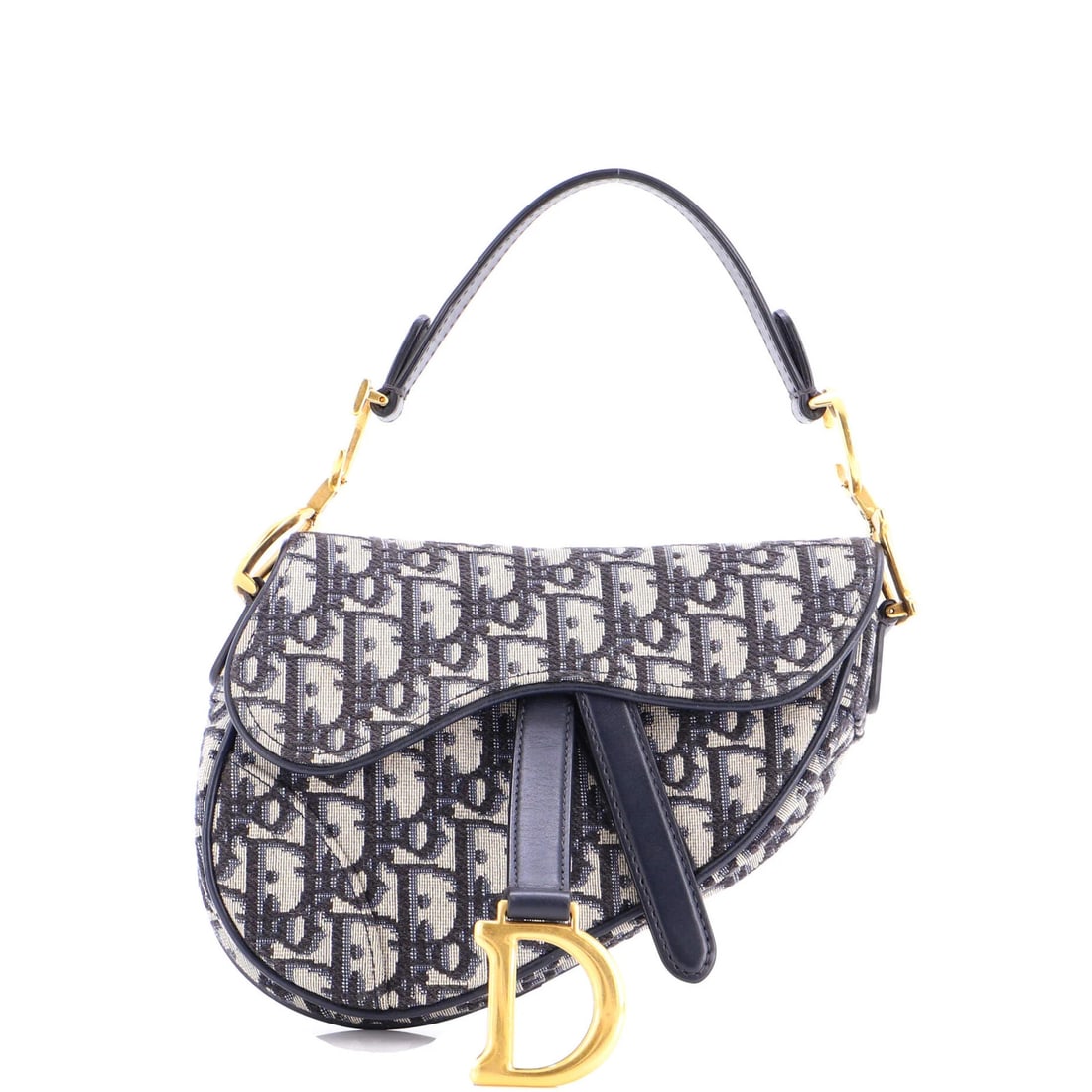 Canvas Oblique Christian Dior Saddle Mini: Canvas Oblique Christian Dior Saddle Mini Canvas Oblique Christian Dior Saddle Mini. This mini shoulder bag features a striking oblique design in blue canvas, with a neutral interior and aged gold
