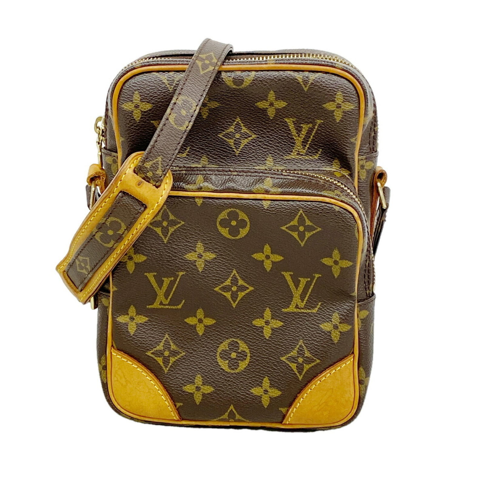 Shoulder Bag by Louis Vuitton: Shoulder Bag by Louis Vuitton Brown Louis Vuitton shoulder bag with dimensions 21cm x 15cm x 9cm. This stylish bag features a classic design with a signature LV monogram pattern. Made from